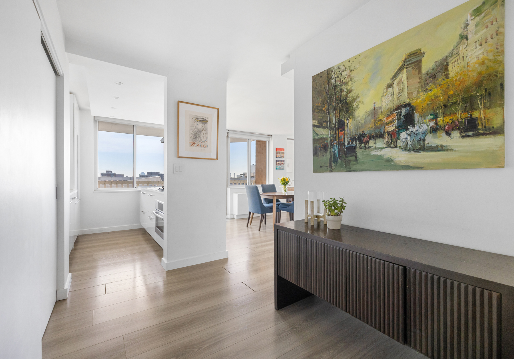 50 Lexington Avenue, Unit 25E Manhattan, NY 10010 - Photo 8 of 13 a view of a living room with a wooden floor