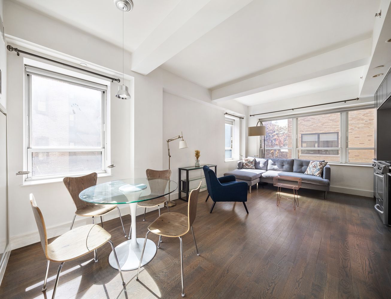 a living room with furniture and a table