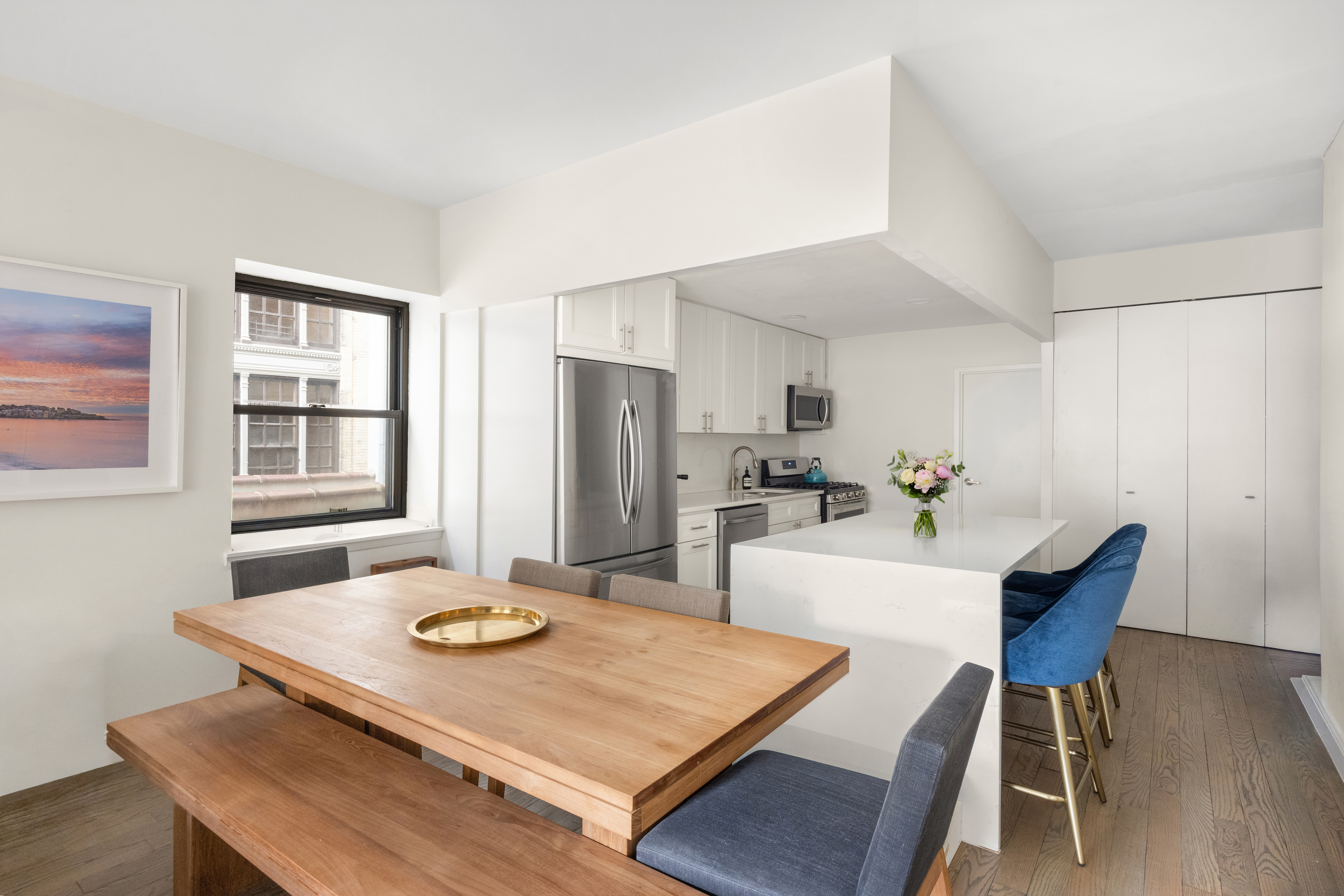 253 West 73rd Street, Unit 4N Manhattan, NY 10023 - Photo 3 of 9 a view of a dining room with furniture and wooden floor