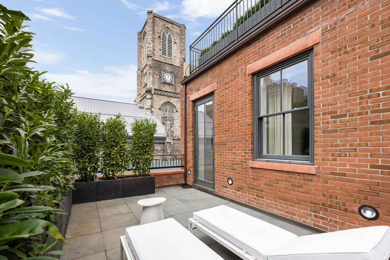 a view of house with backyard