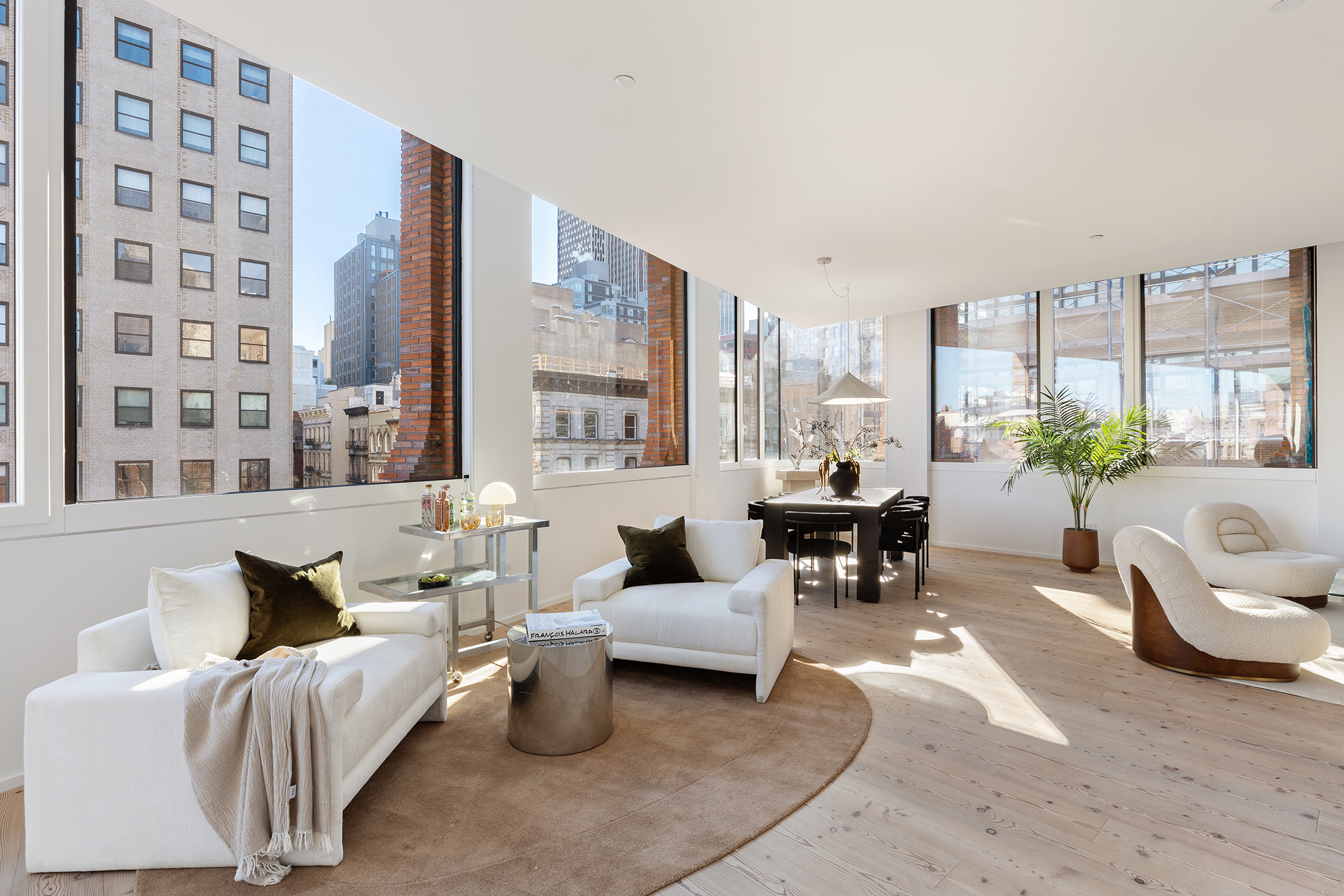 100 Franklin Street, Unit PHS Manhattan, NY 10013 - Photo 7 of 35 a living room with furniture and a large window