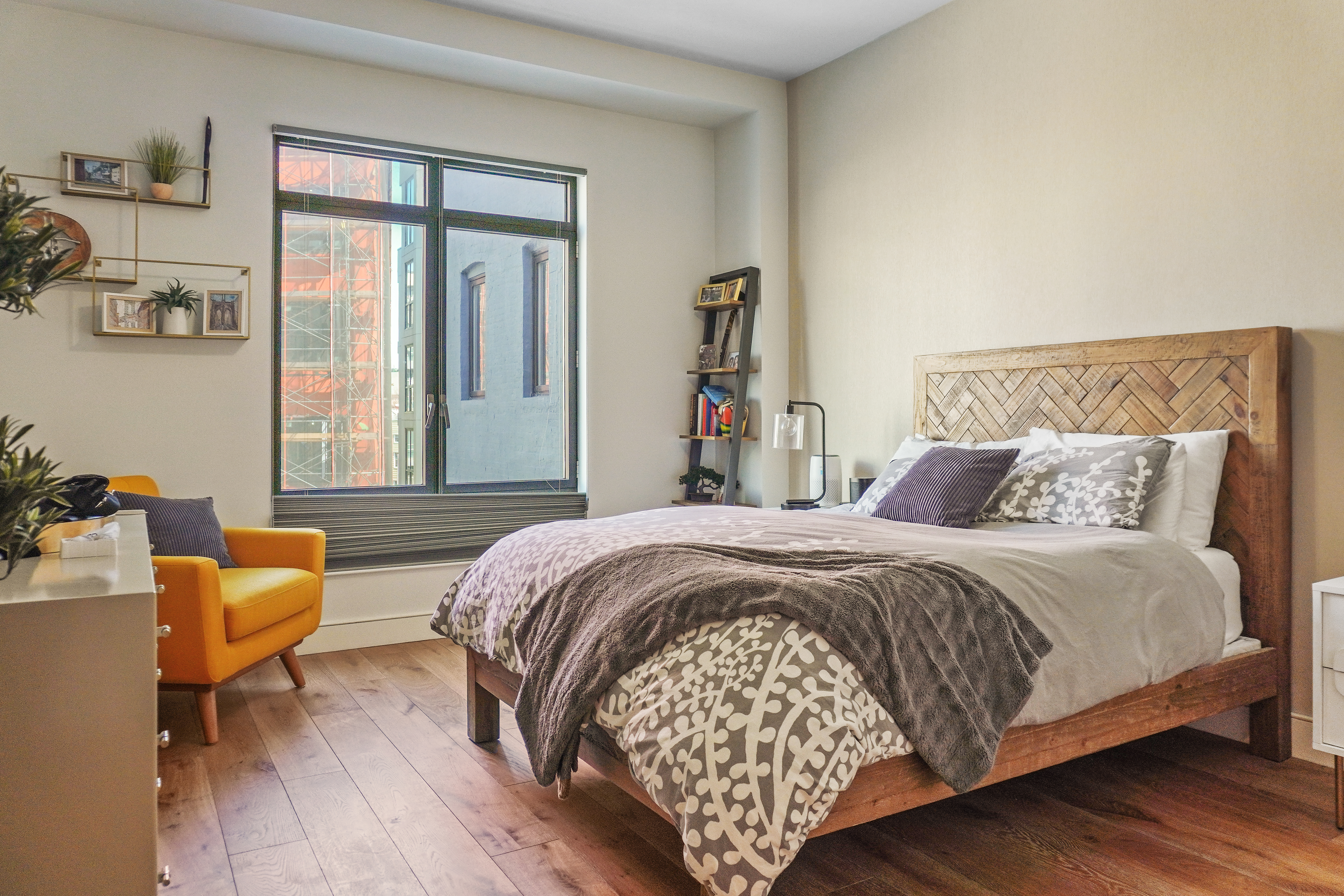 147 Hope Street, Unit 4I Brooklyn, NY 11211 - Photo 3 of 16 a bedroom with bed and a large window