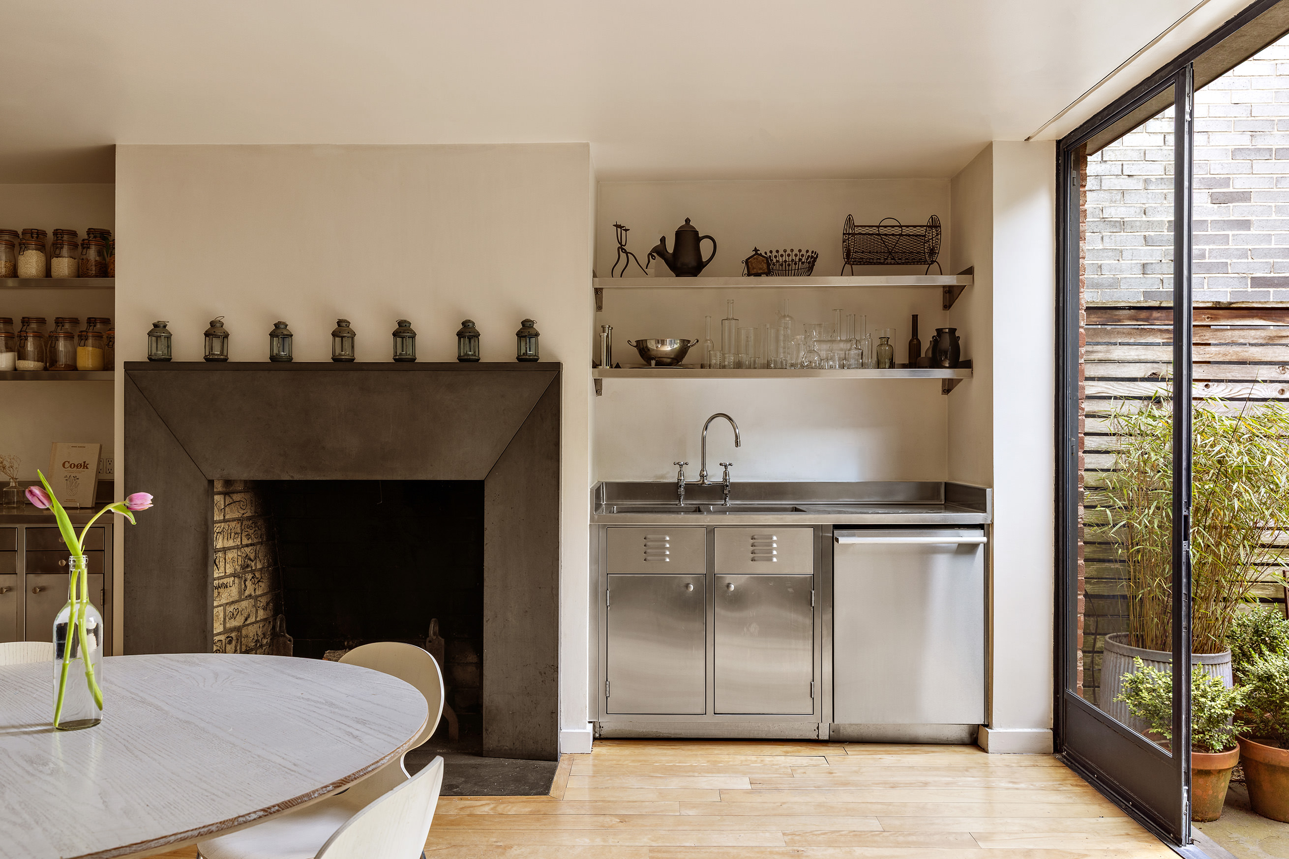 177 Prospect Place Brooklyn, NY 11238 - Photo 11 of 42 a kitchen with kitchen island a counter tops pace a sink and a stove