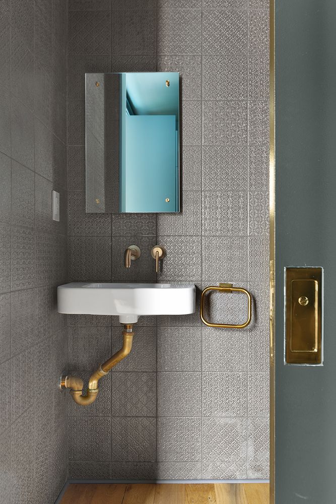 512 Lorimer Street Brooklyn, NY 11211 - Photo 15 of 22 a bathroom with a sink and a mirror