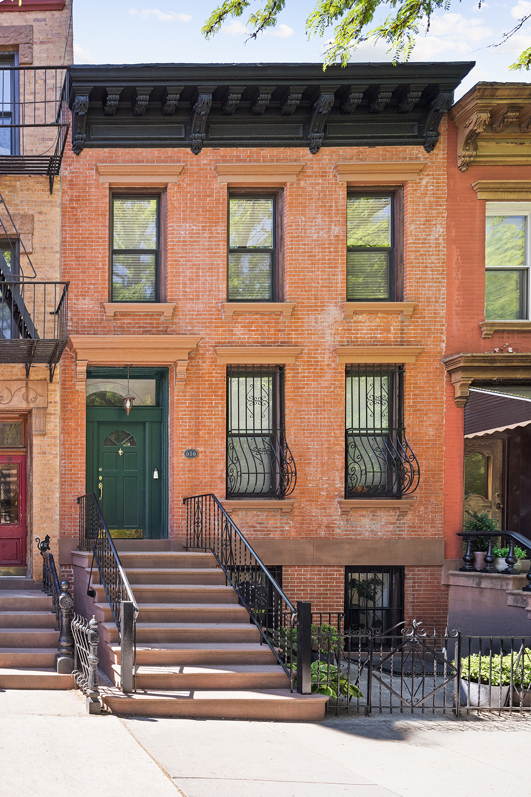 616 Carroll Street, Unit 2 Brooklyn, NY 11215 - Photo 13 of 15 a view of a brick building with many windows