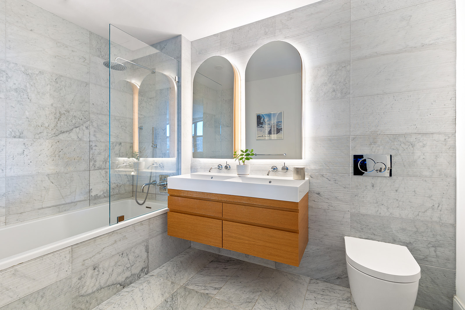 229 9th Street, Unit 601 Brooklyn, NY 11215 - Photo 6 of 13 a bathroom with a double vanity sink toilet and shower