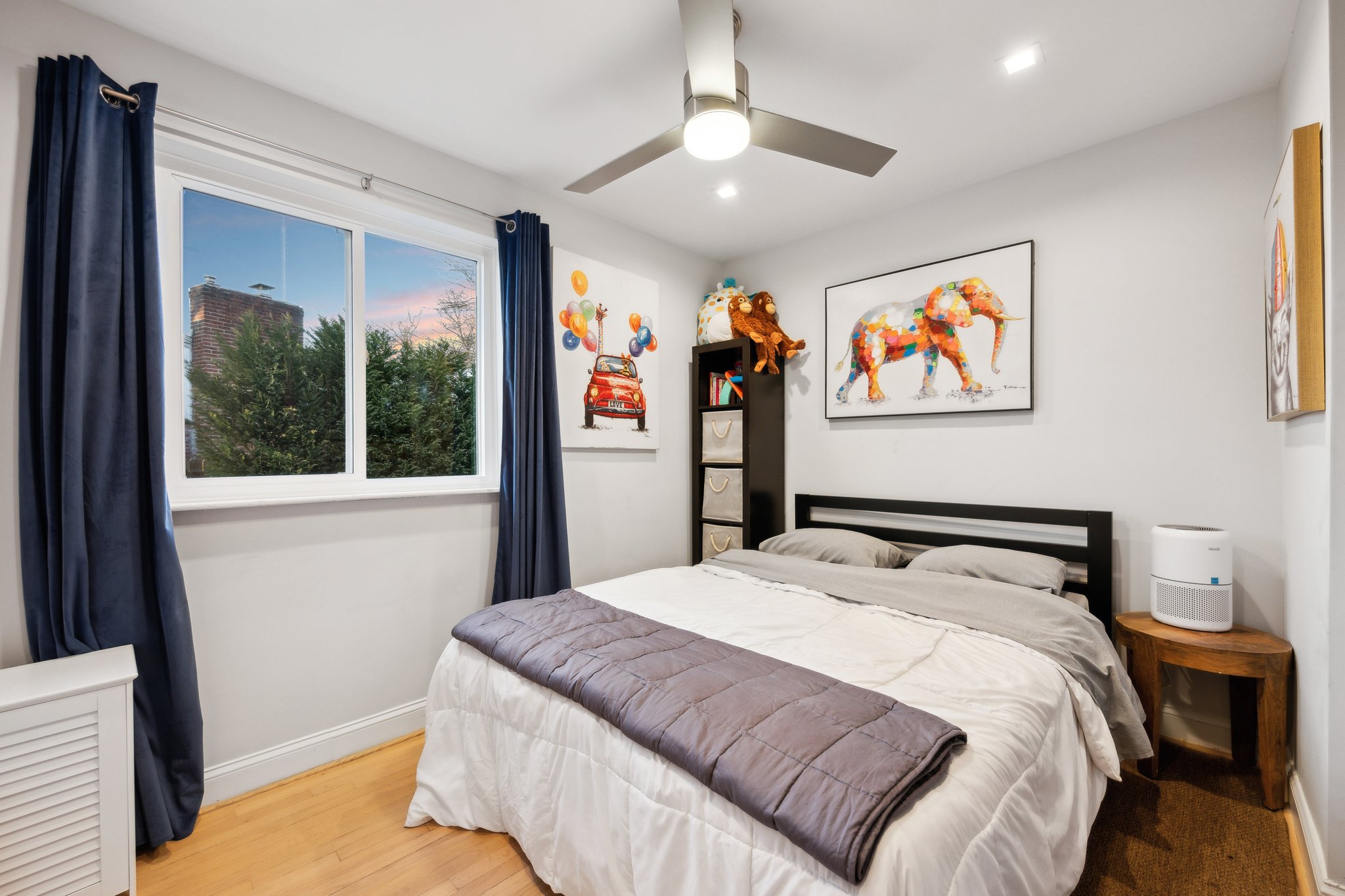 2607 Ross Road Chevy Chase, MD 20815 - Photo 14 of 37 a bedroom with a bed and glass window