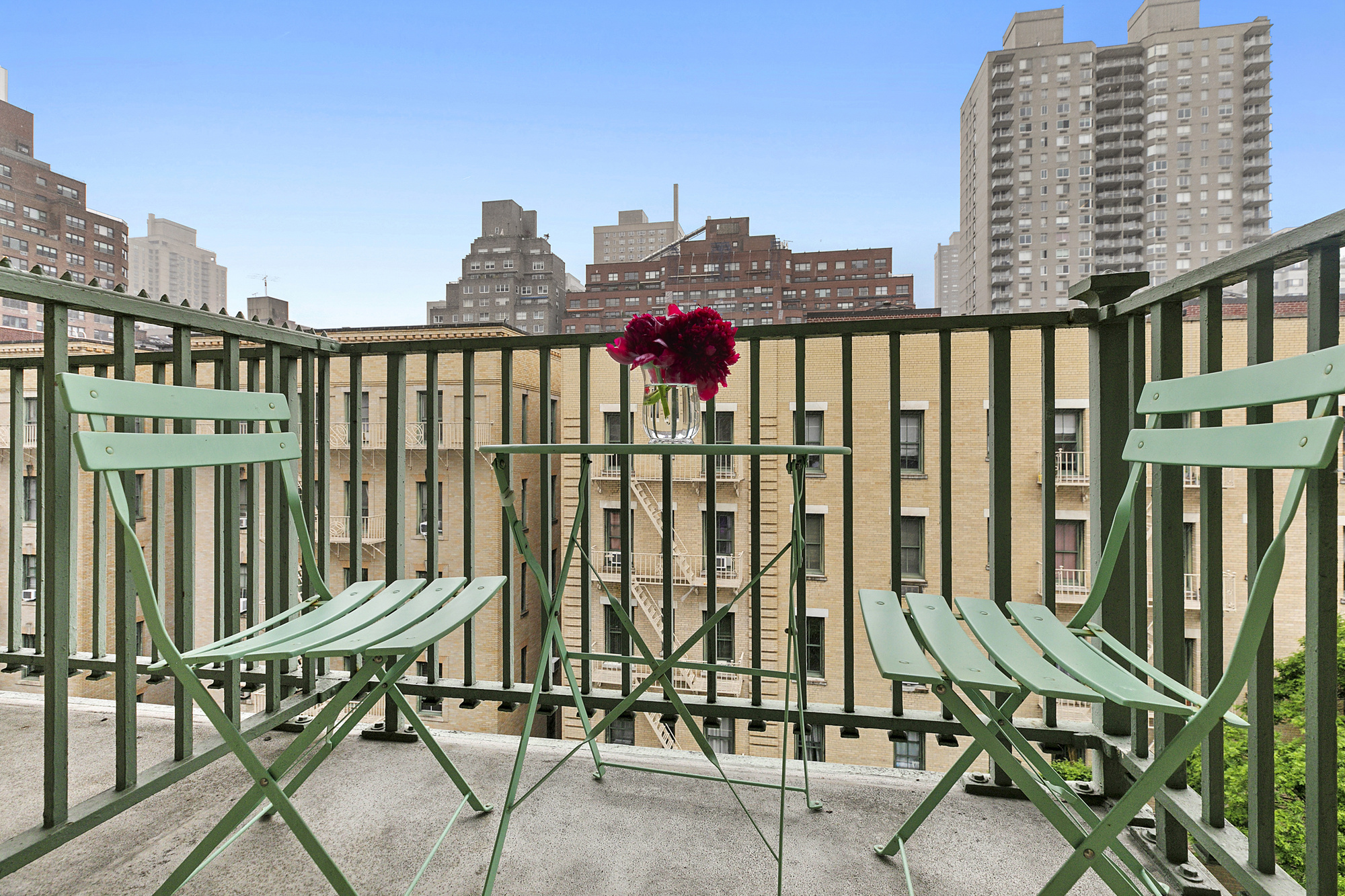 508 East 78th Street, Unit 6O Manhattan, NY 10075 - Photo 5 of 11 a view of balcony with a potted plant and stairs