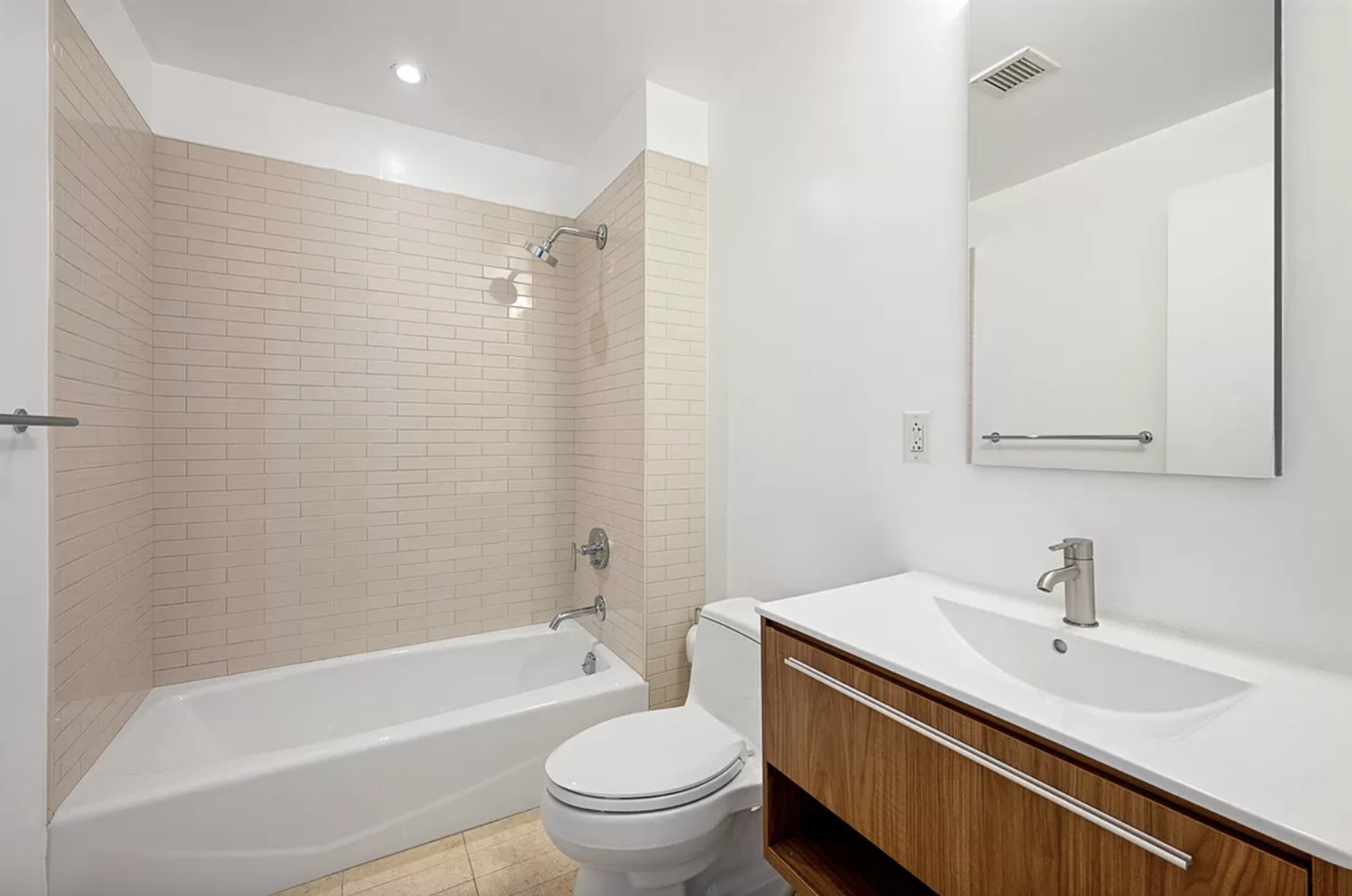 20 Henry Street, Unit 1CN Brooklyn, NY 11201 - Photo 3 of 9 a bathroom with a sink toilet and shower