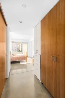 a view of a bathroom with a tub and a shower