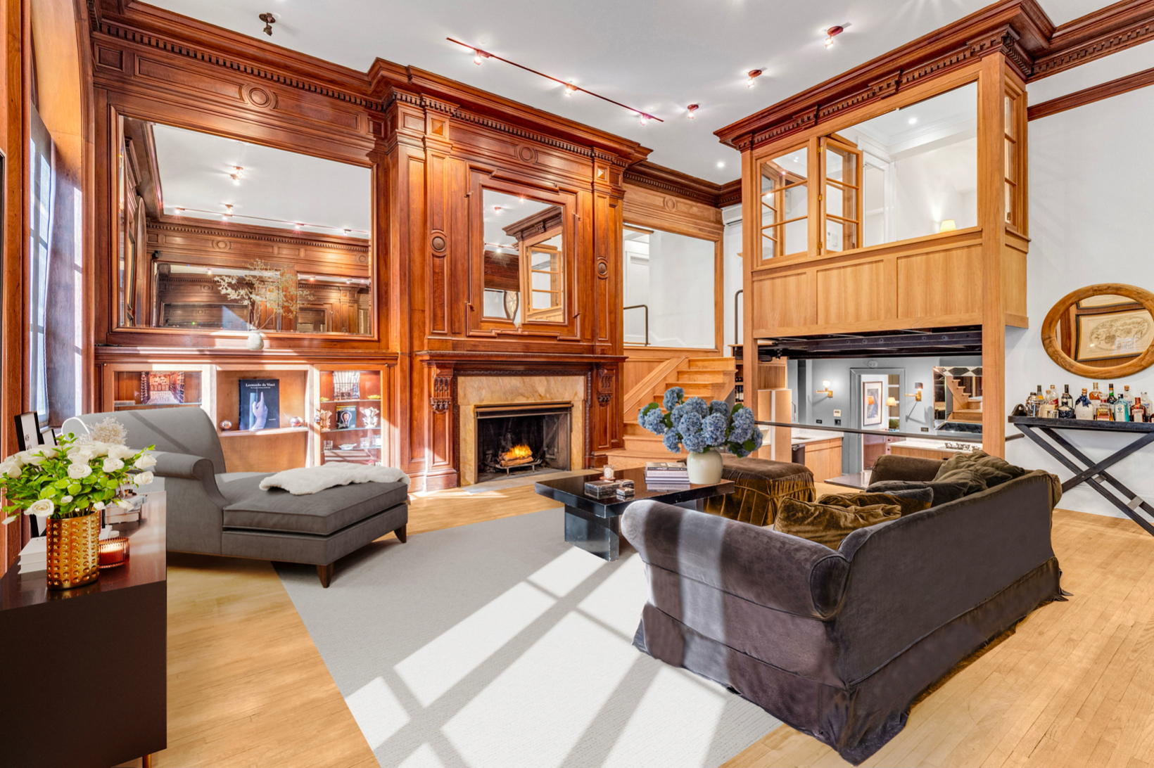 35 East 68th Street, Unit 2A Manhattan, NY 10021 - Photo 2 of 19 a living room with furniture a fireplace and potted plants