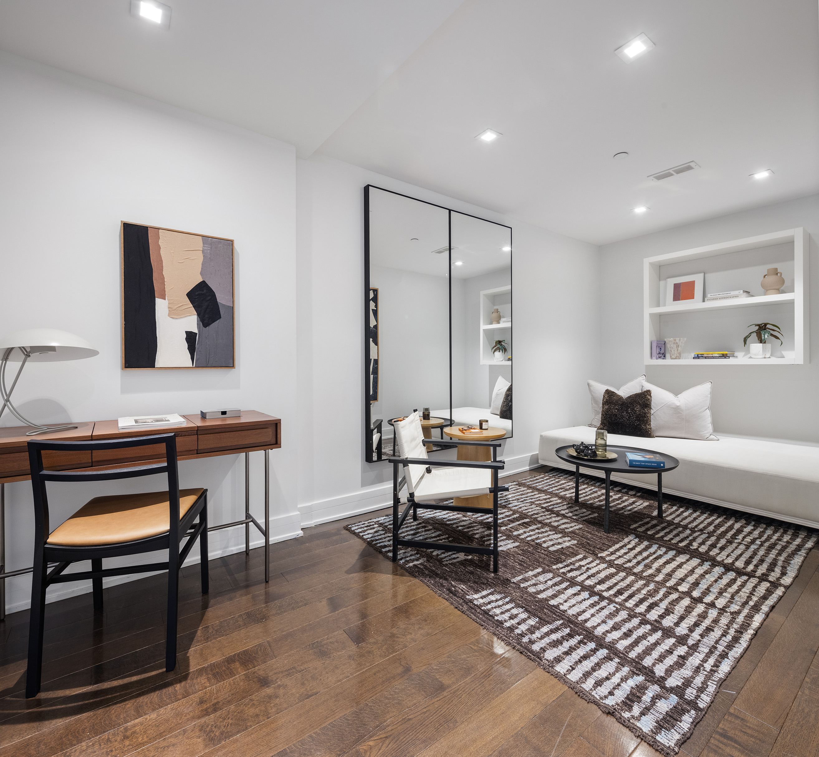 5 Franklin Place, Unit 9D Manhattan, NY 10013 - Photo 12 of 20 a living room with furniture and a wooden floor