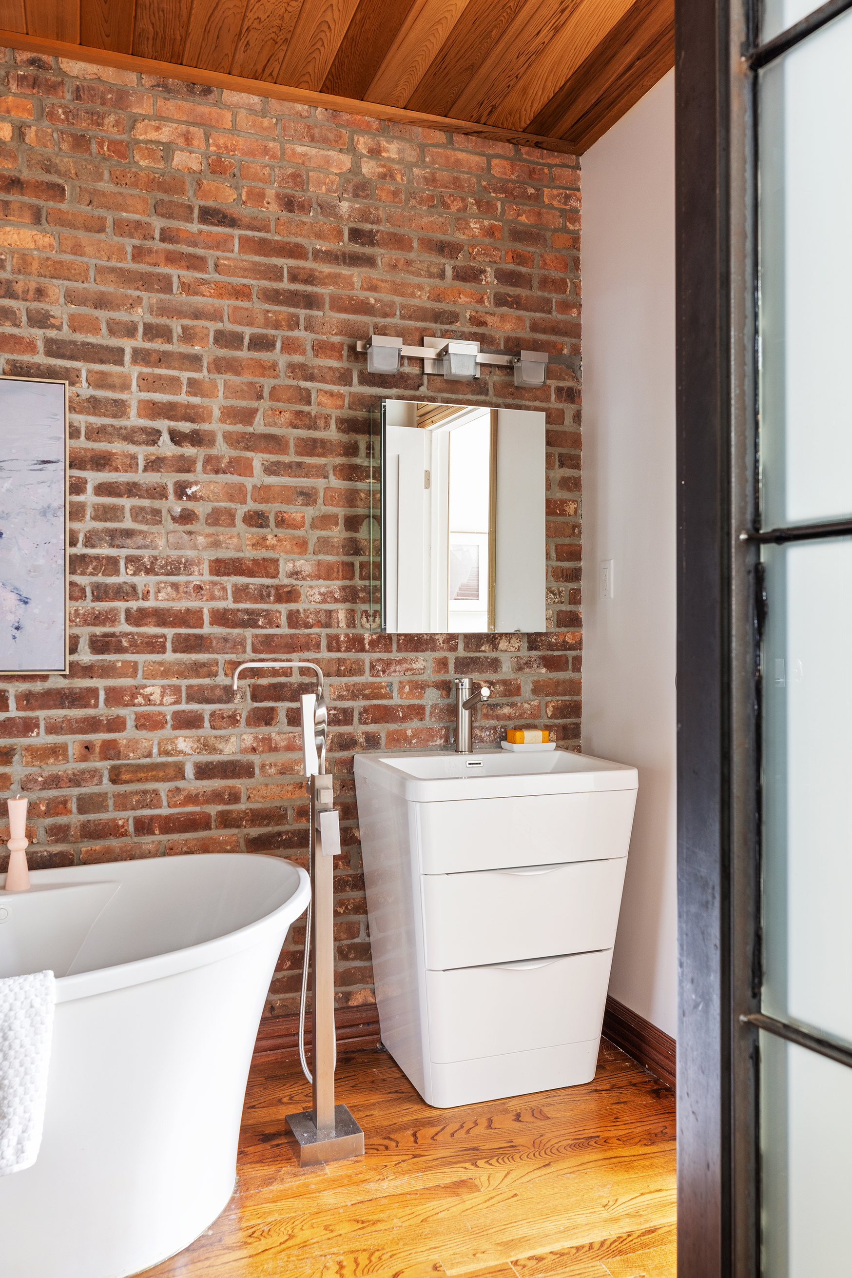 412 Classon Avenue Brooklyn, NY 11238 - Photo 7 of 30 a bathroom with a bathtub and a sink