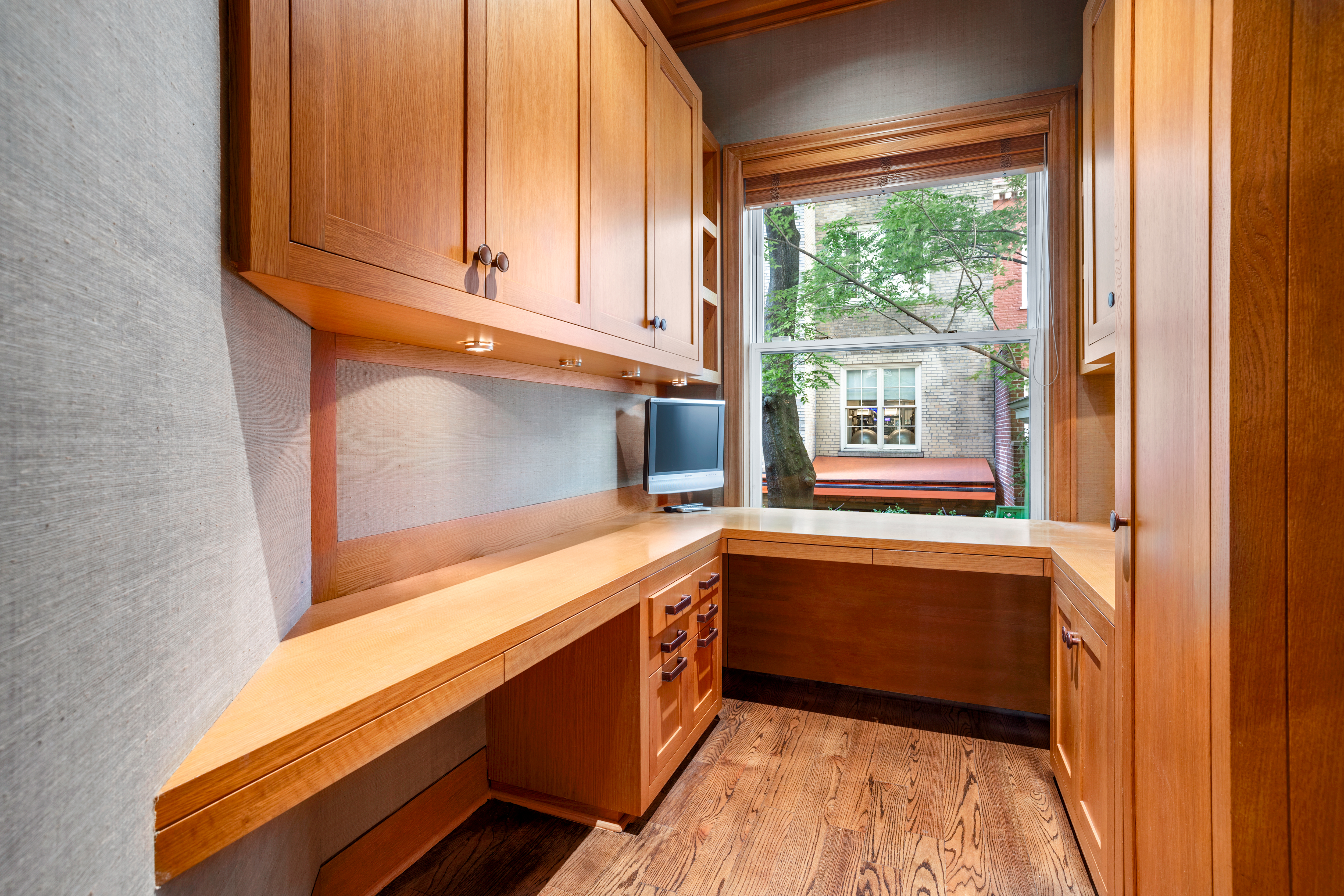 22 East 78th Street Manhattan, NY 10075 - Photo 13 of 23 a kitchen with stainless steel appliances granite countertop a sink and a cabinets