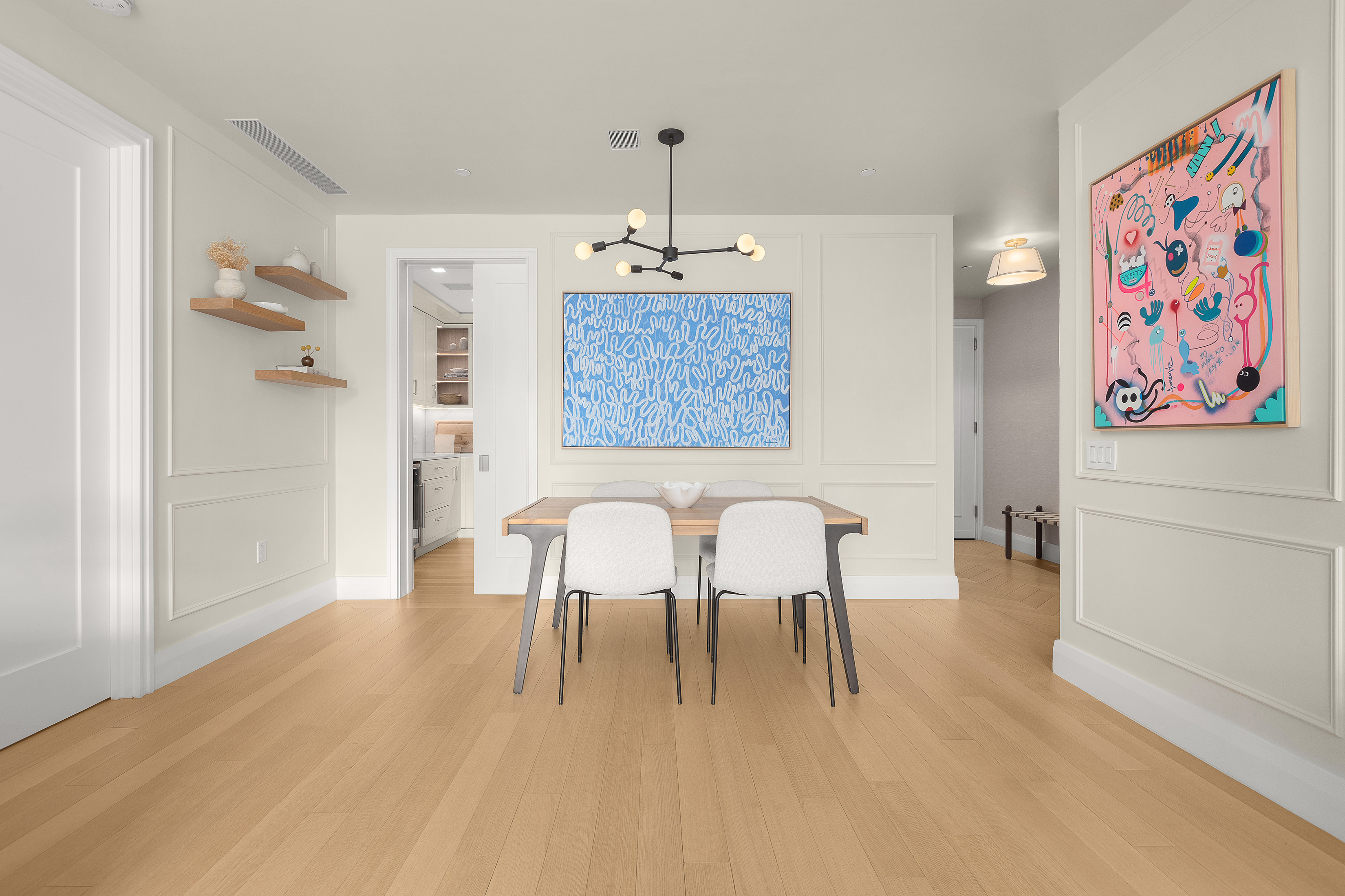 200 East 83rd Street, Unit 8C Manhattan, NY 10028 - Photo 8 of 26 a view of a dining room with furniture and wooden floor