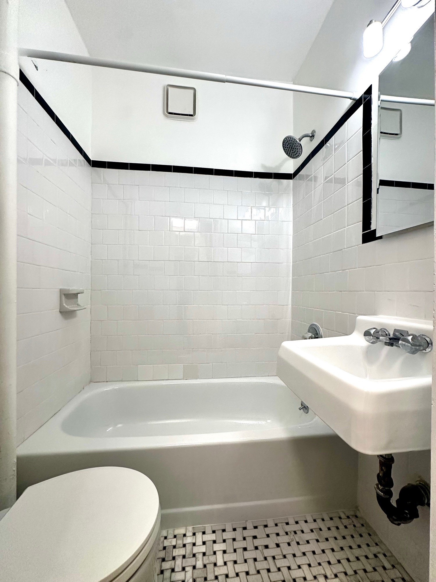 85 Bergen Street, Unit 2C Brooklyn, NY 11201 - Photo 6 of 6 a bathroom with a sink a toilet and shower