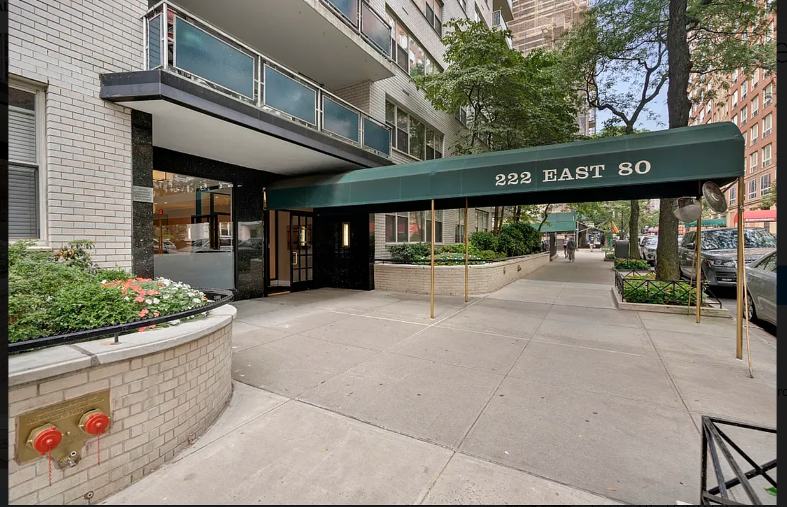 222 East 80th Street, Unit 3A Manhattan, NY 10075 - Photo 14 of 16 a front view of a building with garden