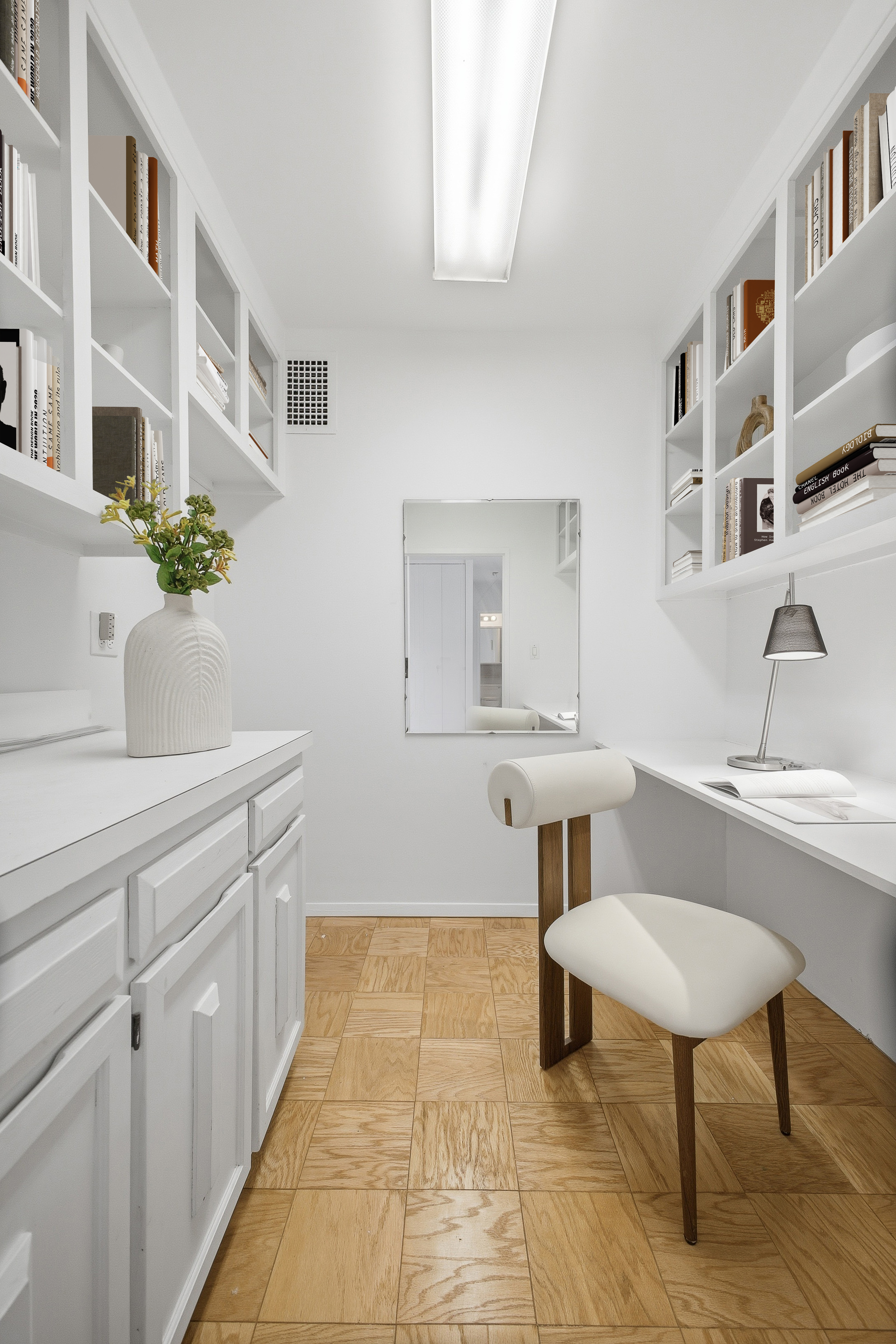 160 East 38th Street, Unit 26FG Manhattan, NY 10016 - Photo 7 of 23 a bathroom with a sink and a mirror