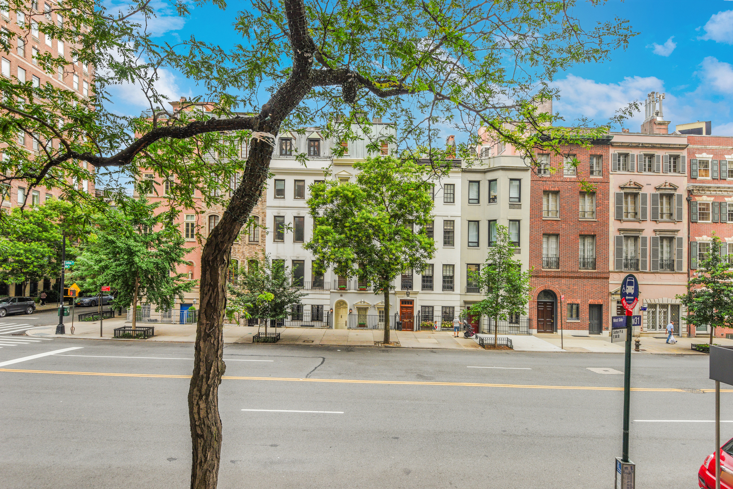 16 Sutton Place, Unit 2B Manhattan, NY 10022 - Photo 15 of 20 a view of a building with a street