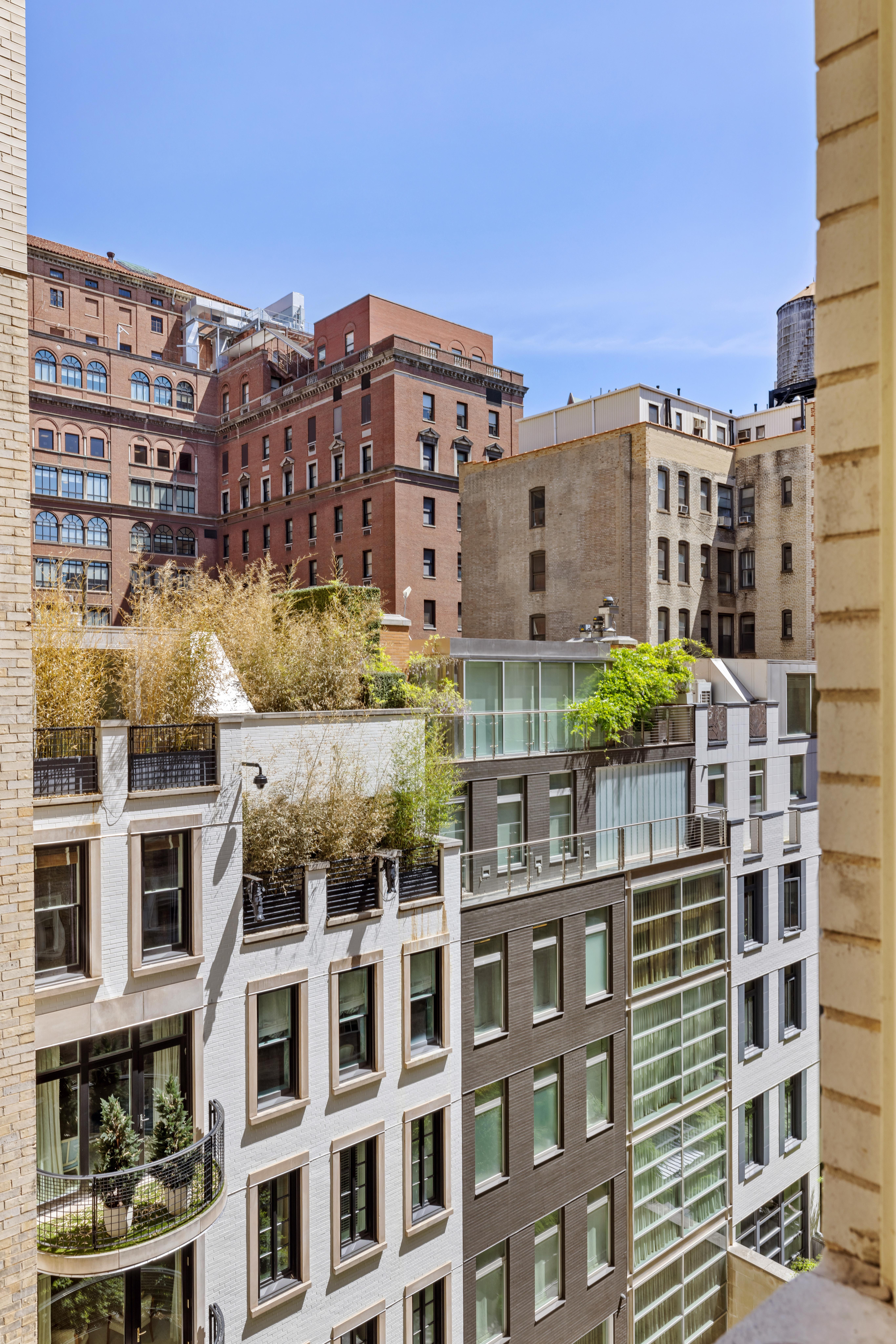 823 Park Avenue, Unit 5 Manhattan, NY 10021 - Photo 9 of 18 a city view with tall building