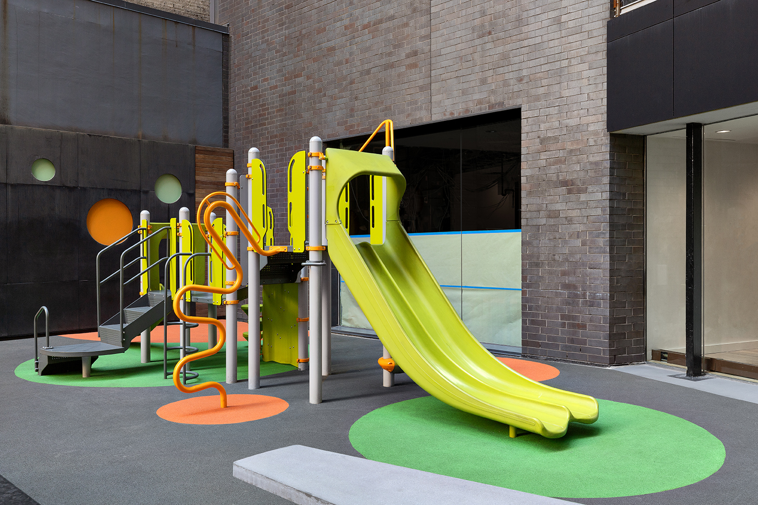 15 William Street, Unit 22H Manhattan, NY 10005 - Photo 13 of 20 a view of a park with a slide