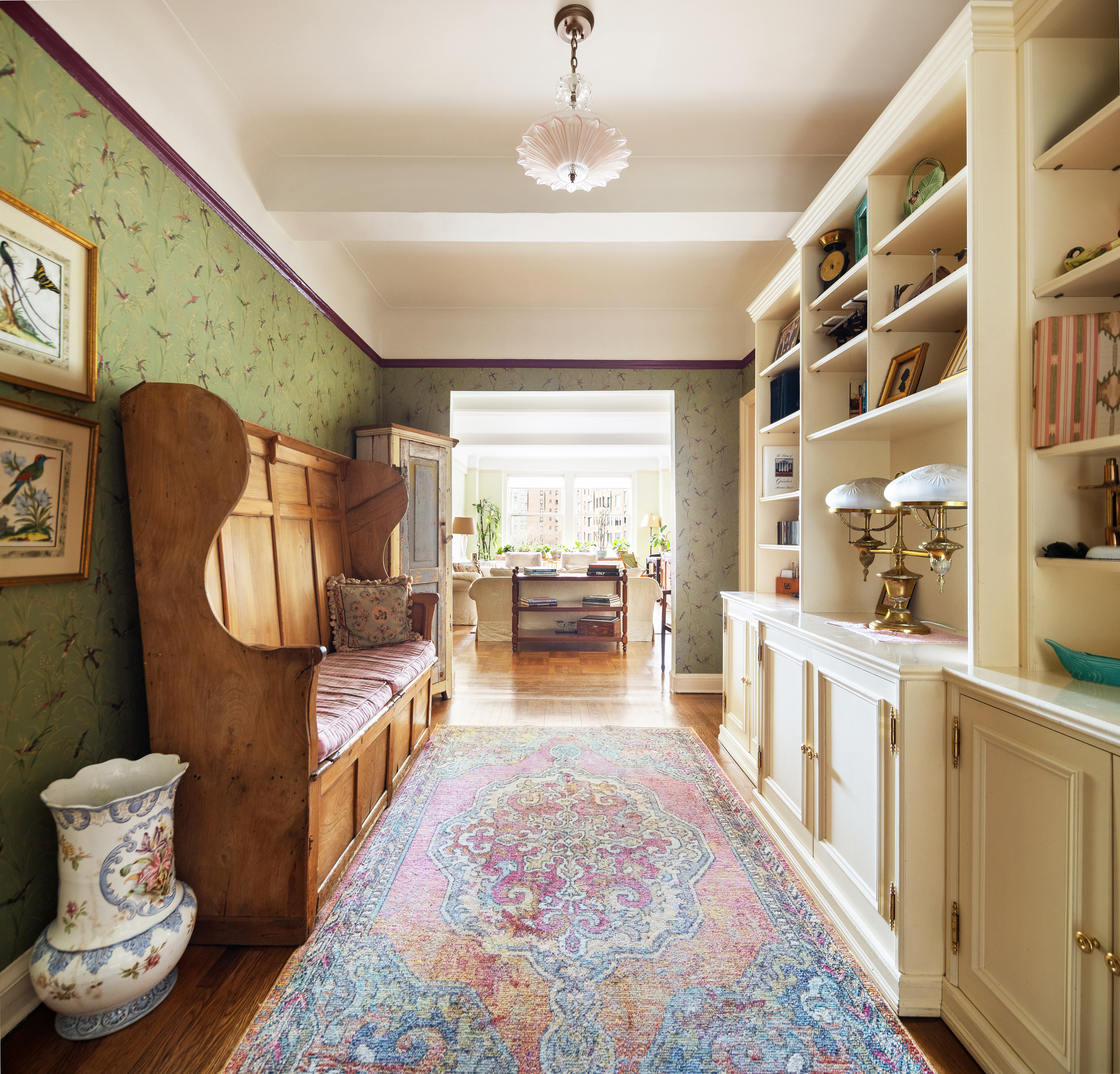 330 West 72nd Street, Unit 7A Manhattan, NY 10023 - Photo 7 of 10 a living room with furniture and a wooden floor