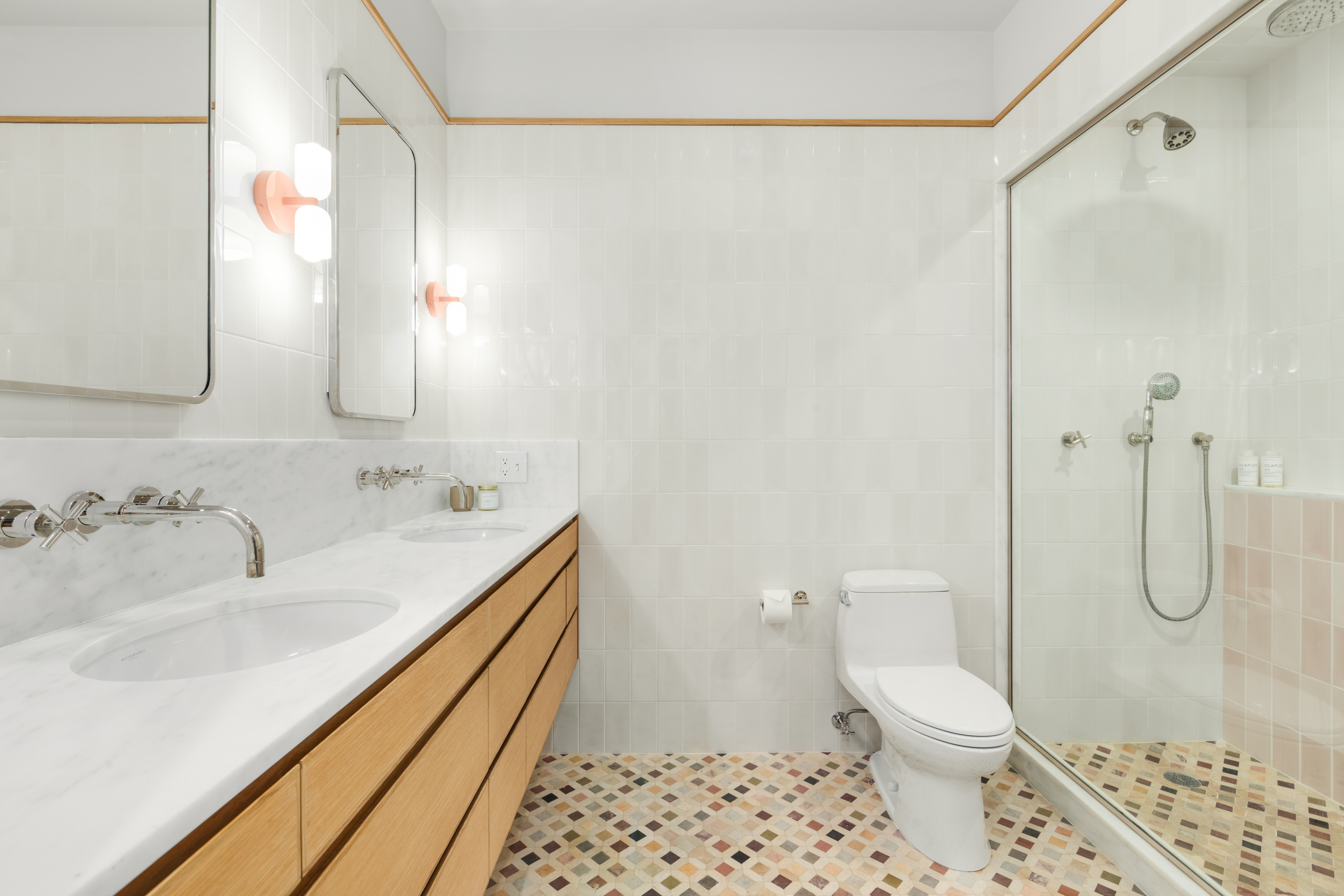 152 Underhill Avenue Brooklyn, NY 11238 - Photo 14 of 20 a bathroom with a sink a toilet and shower