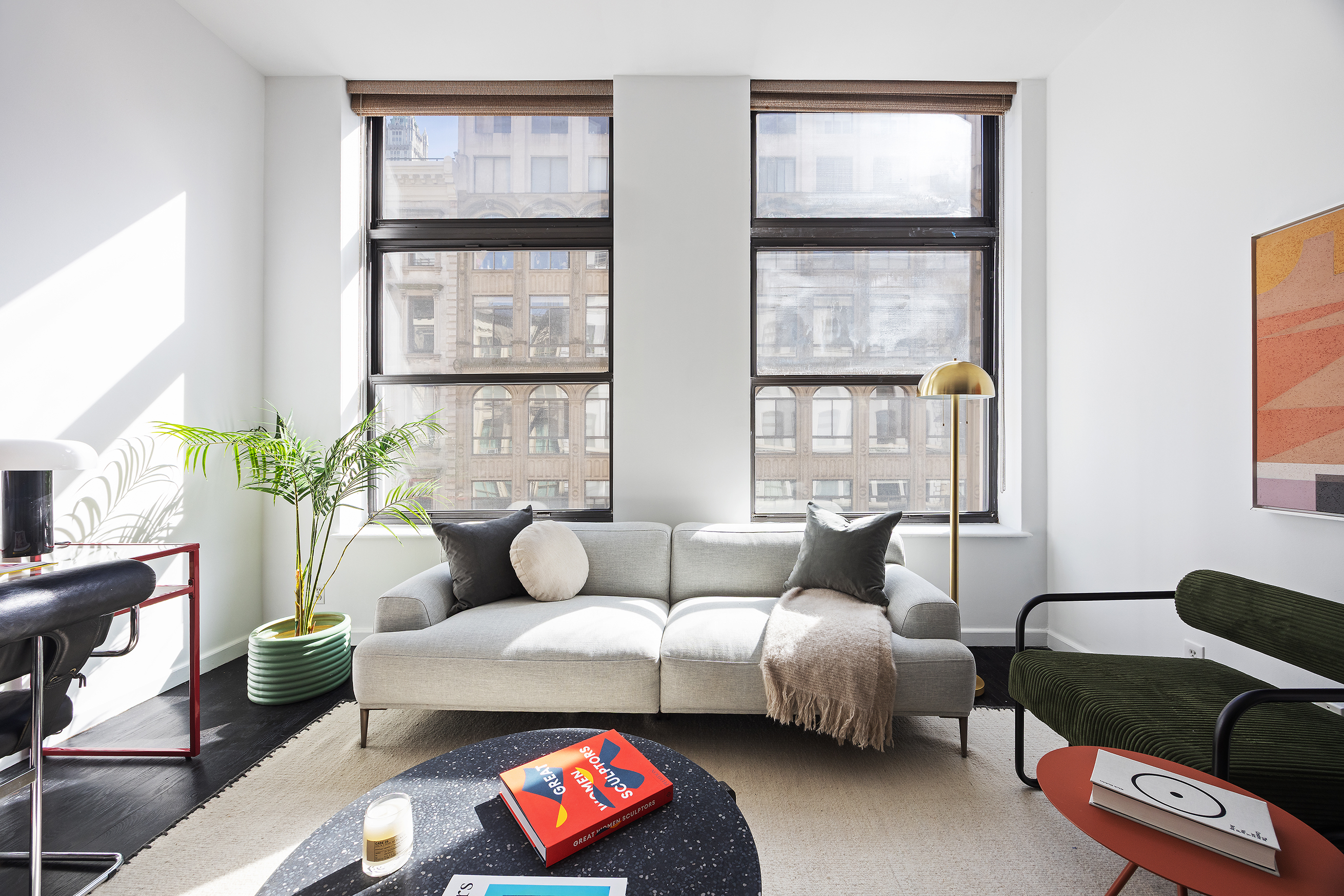 100 Reade Street, Unit 3C Manhattan, NY 10013 - Photo 2 of 9 a living room with furniture and a large window