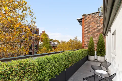 a view of a balcony with an outdoor space