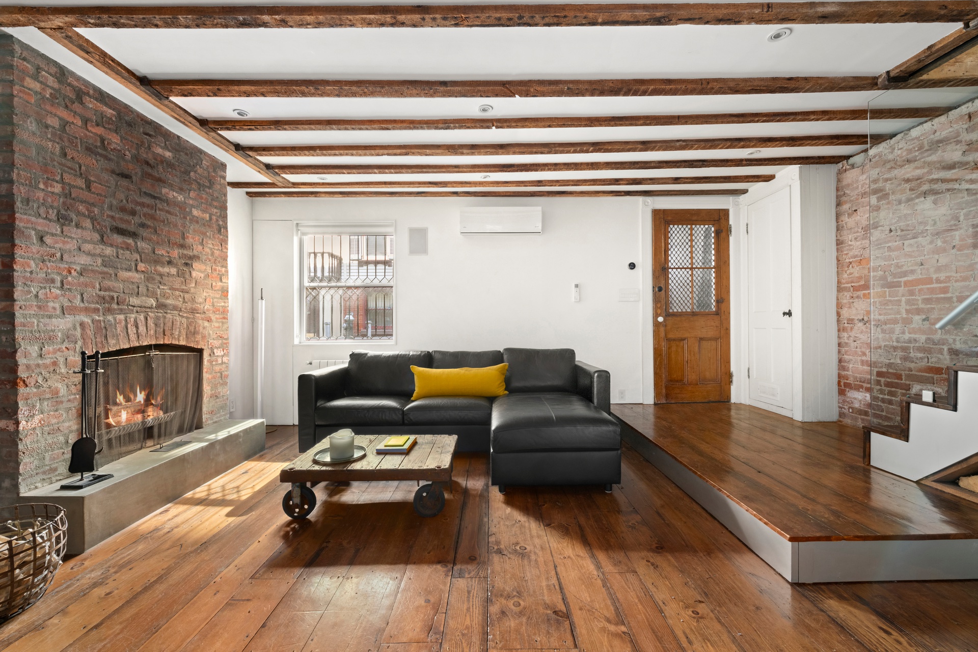 8 Sylvan Terrace Manhattan, NY 10032 - Photo 6 of 19 a living room with furniture and a fireplace