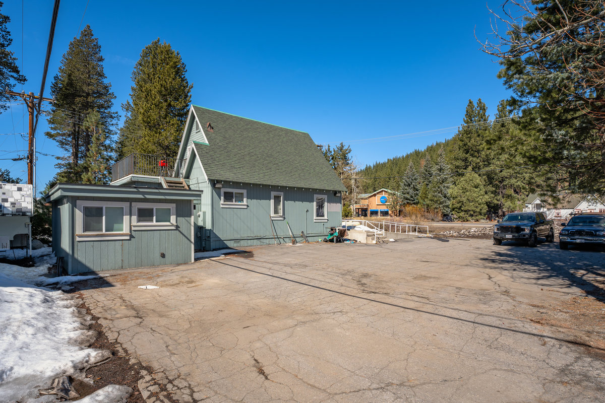 11105 Donner Pass Road Truckee, CA 96161 - Photo 7 of 13 a view of a house with a yard and sitting area