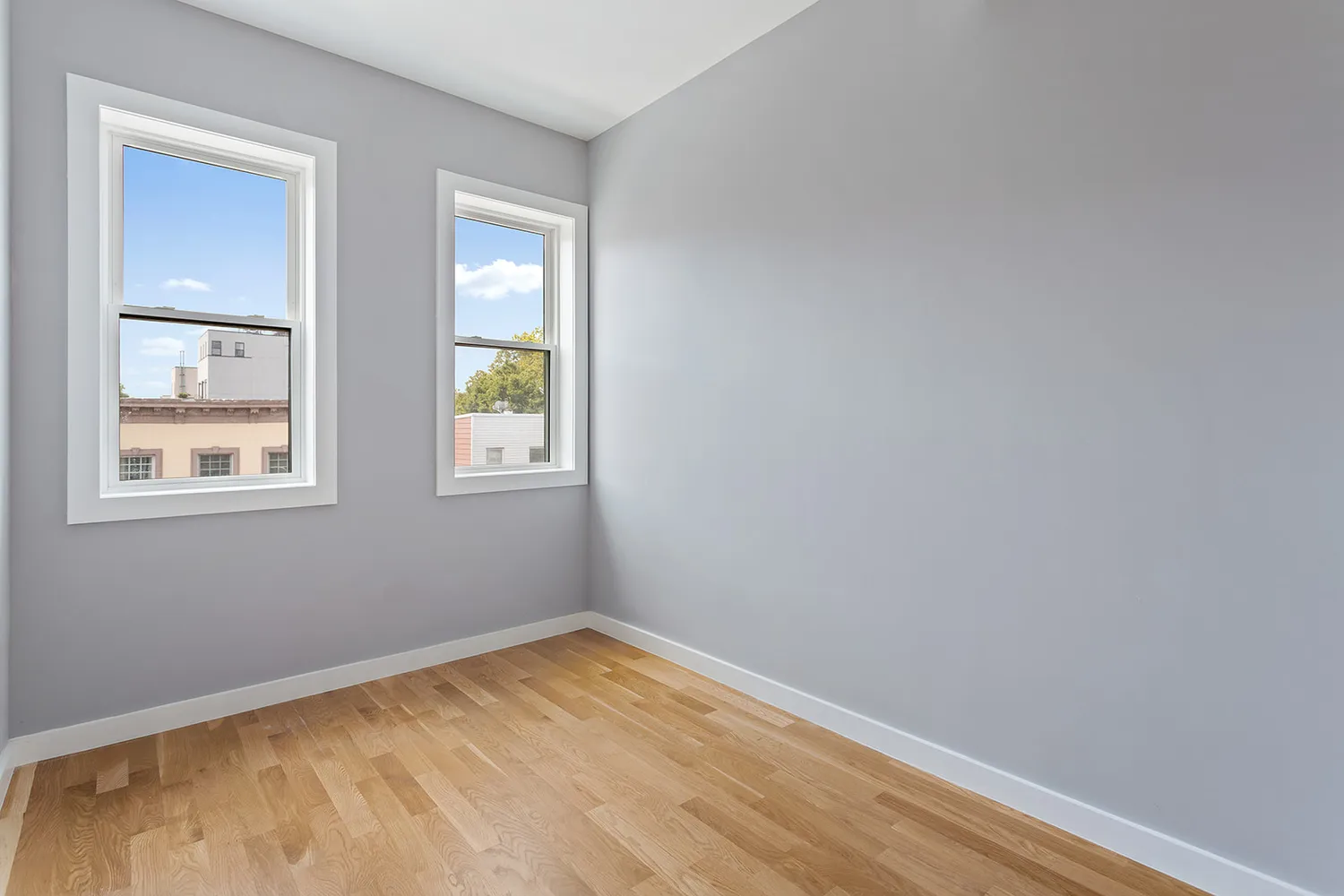 a view of empty room with windows