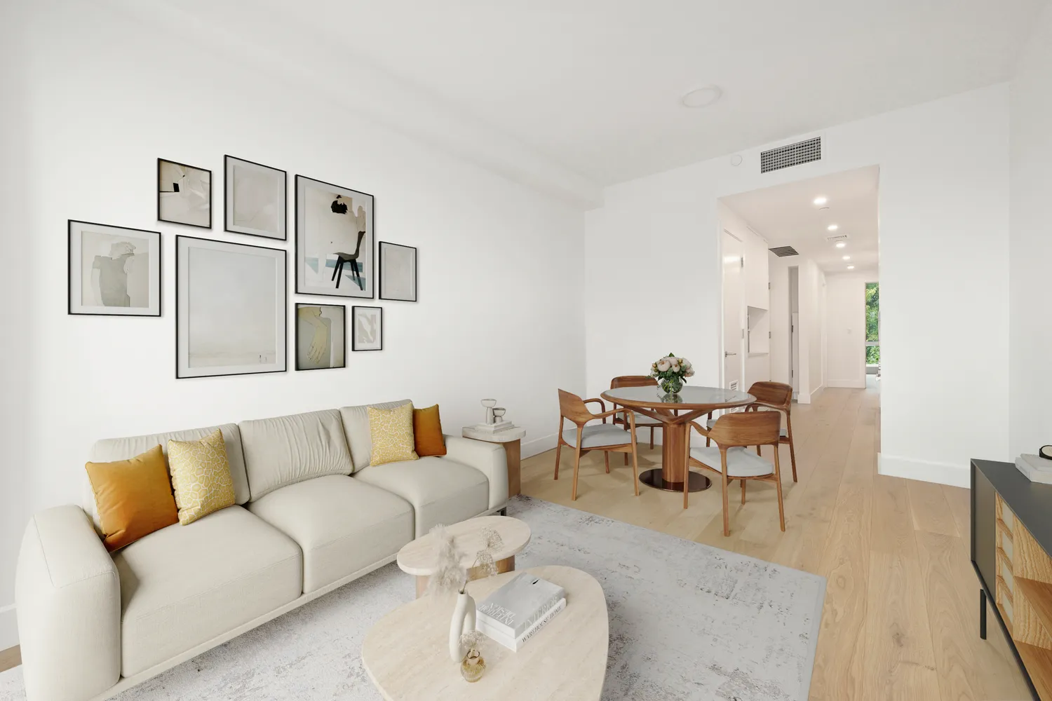 a living room with furniture and a dining table
