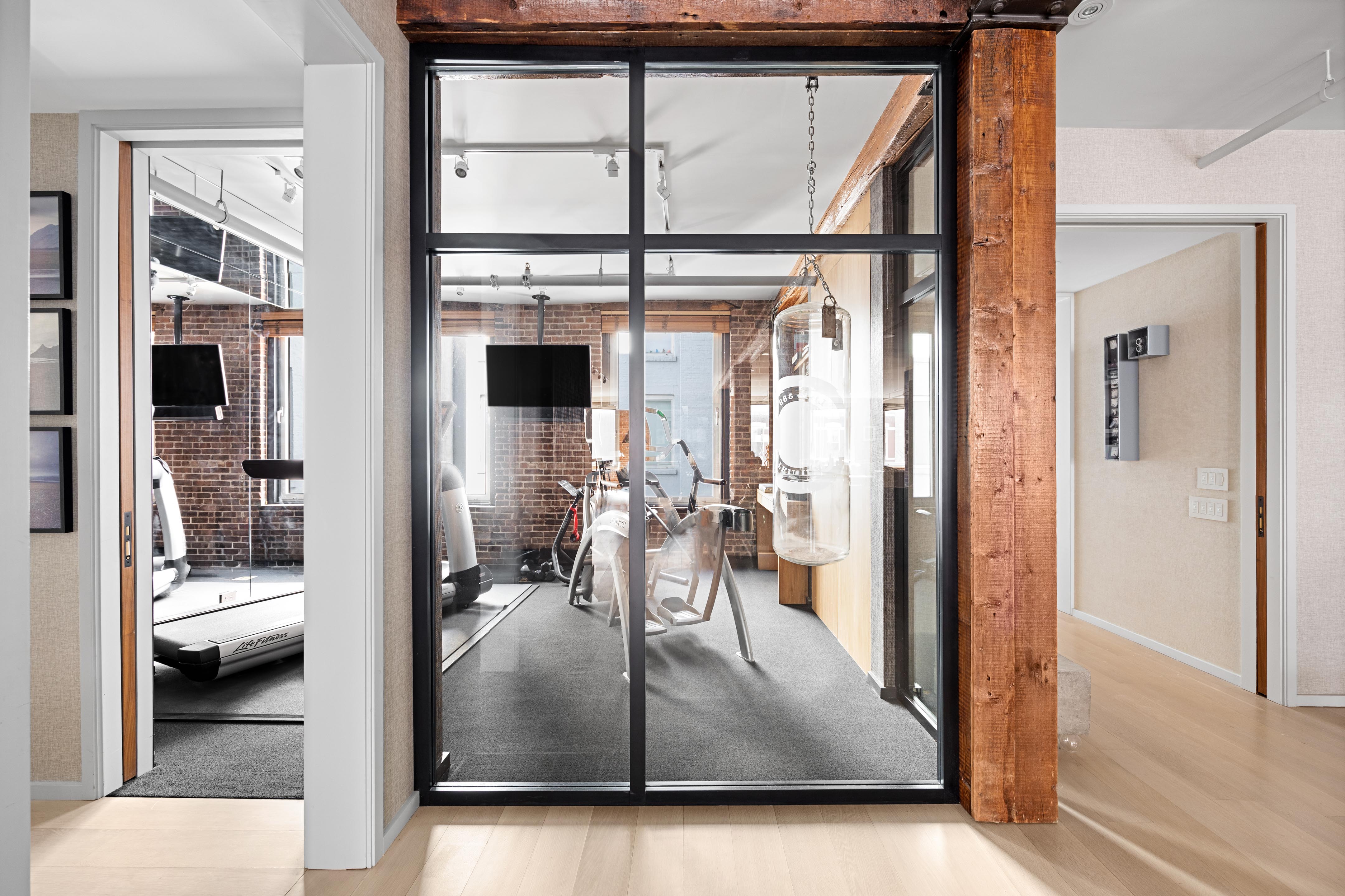 420 West Broadway, Unit 4W Manhattan, NY 10012 - Photo 15 of 17 a view of a living room and a balcony