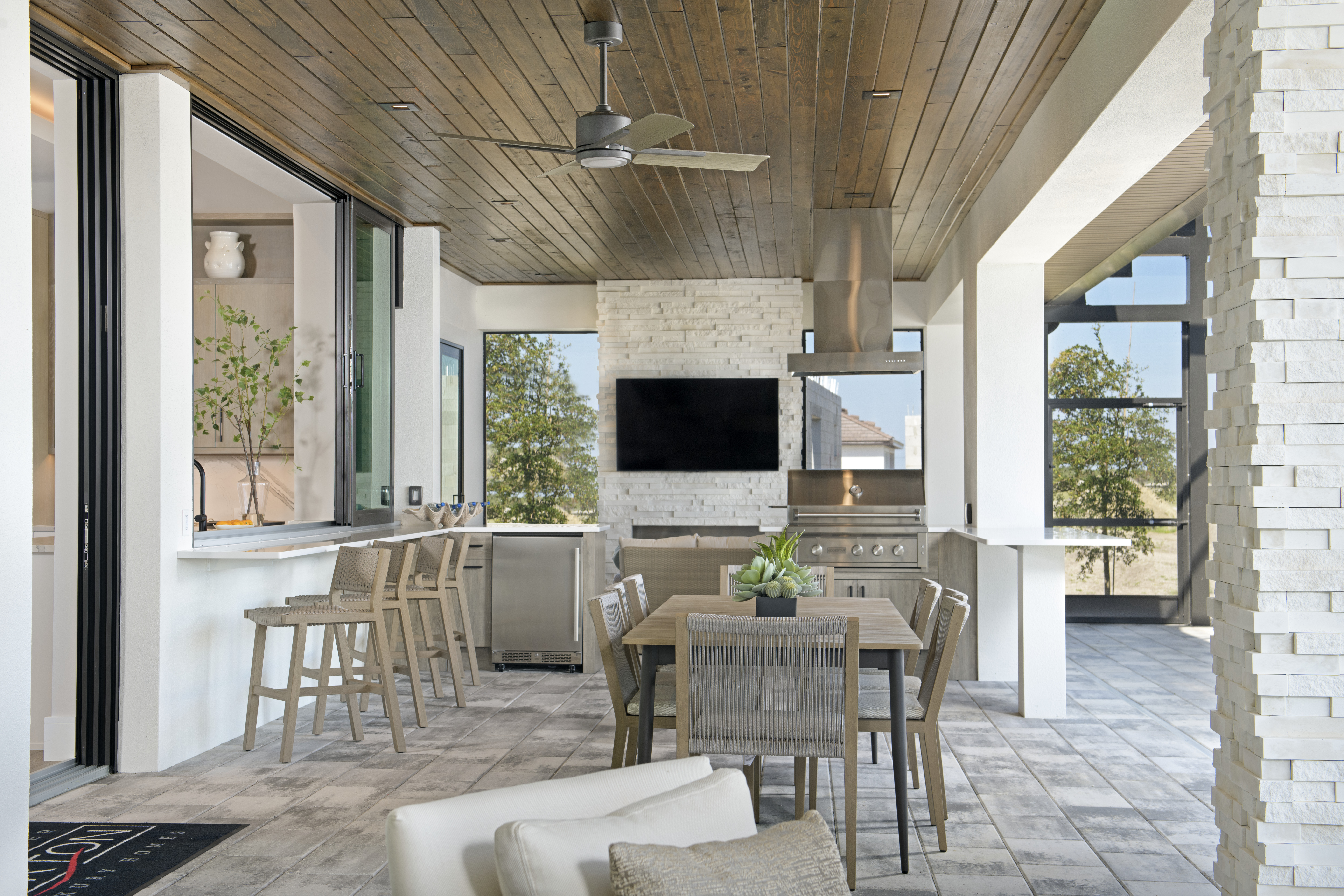 Address Upon Request Rockledge, FL 32955 - Photo 25 of 28 a living room with furniture a flat screen tv and a floor to ceiling window