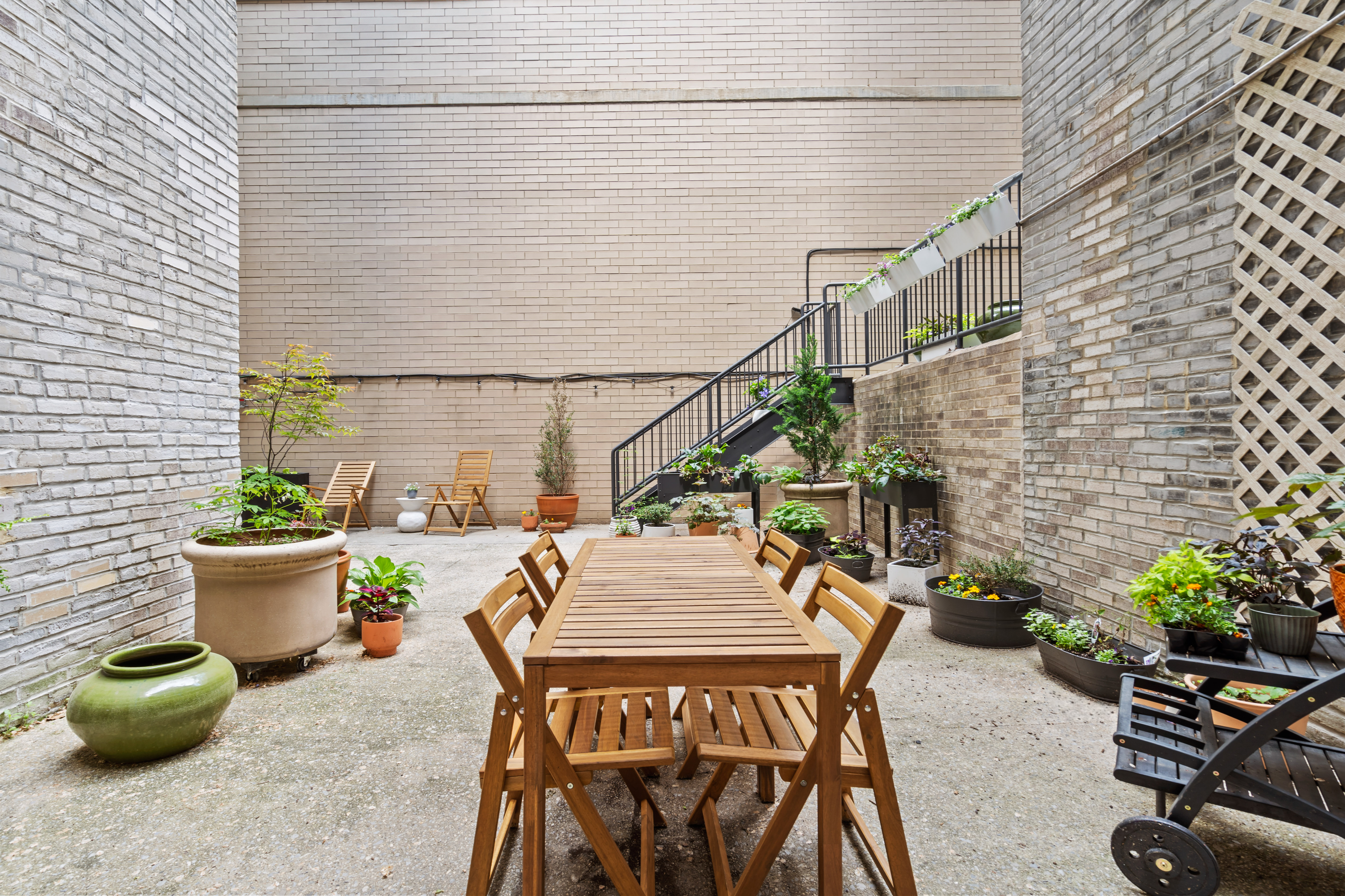 225 West 25th Street, Unit 5D Manhattan, NY 10001 - Photo 13 of 16 a outdoor space with a couch and chairs