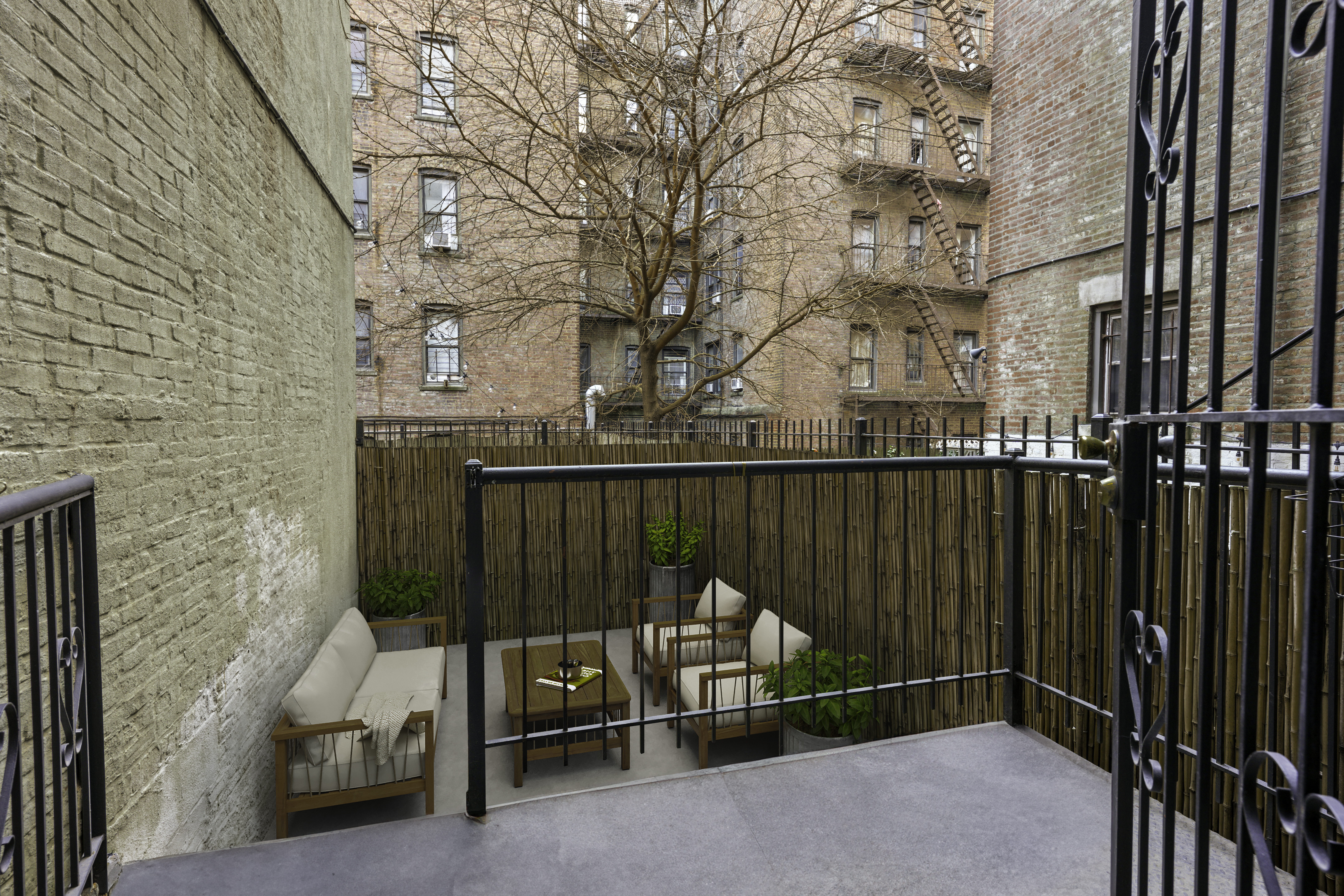 714 St Nicholas Avenue, Unit 1 Manhattan, NY 10031 - Photo 16 of 18 a view of backyard with cabin