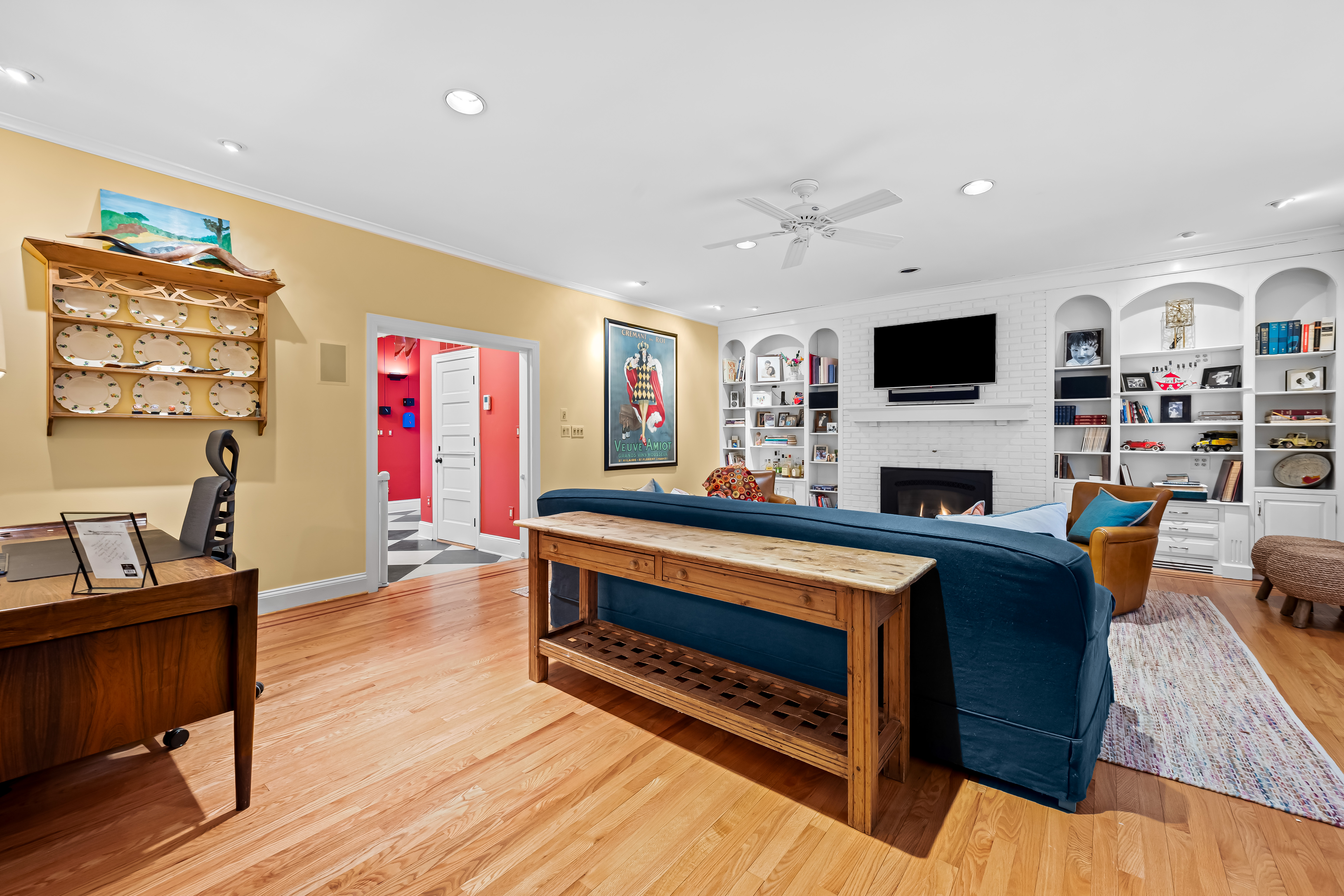 8412 Stevenson Road Pikesville, MD 21208 - Photo 22 of 81 a living room with furniture fireplace and flat screen tv