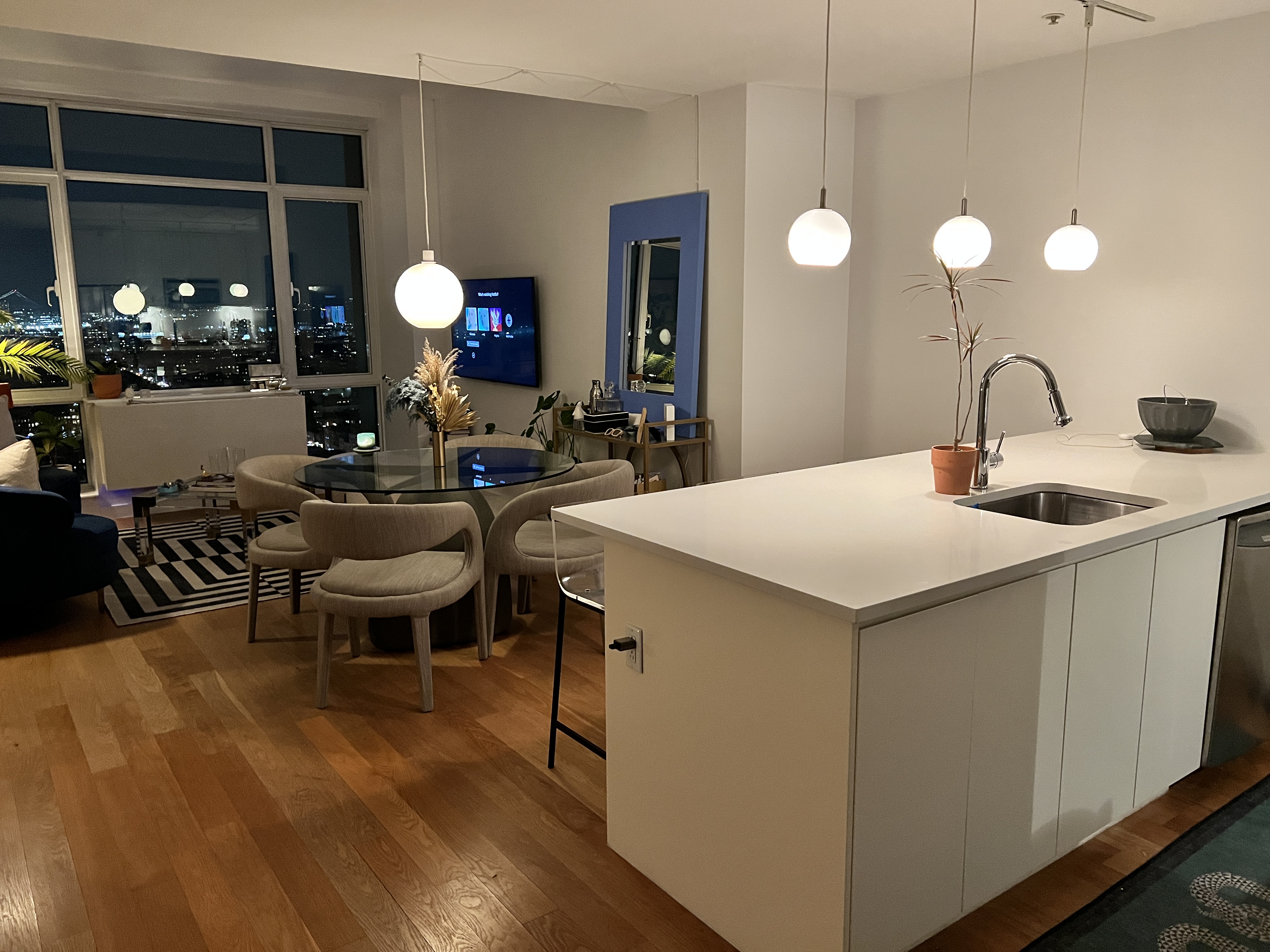 189 Schermerhorn Street, Unit PHC Brooklyn, NY 11201 - Photo 3 of 19 a large kitchen with a table and chairs