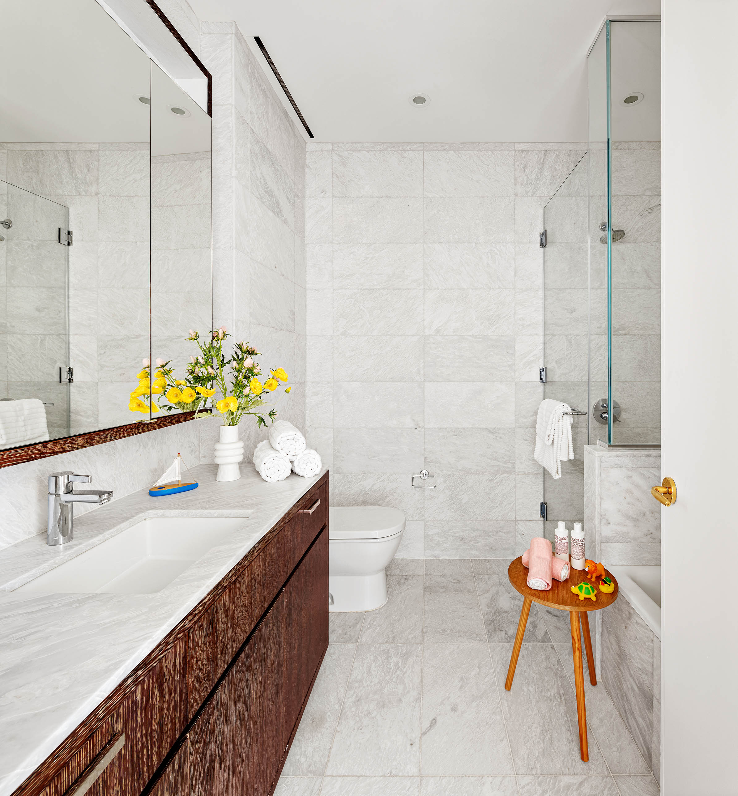 505 West 19th Street, Unit PH1 Manhattan, NY 10011 - Photo 19 of 26 a bathroom with a sink and a mirror