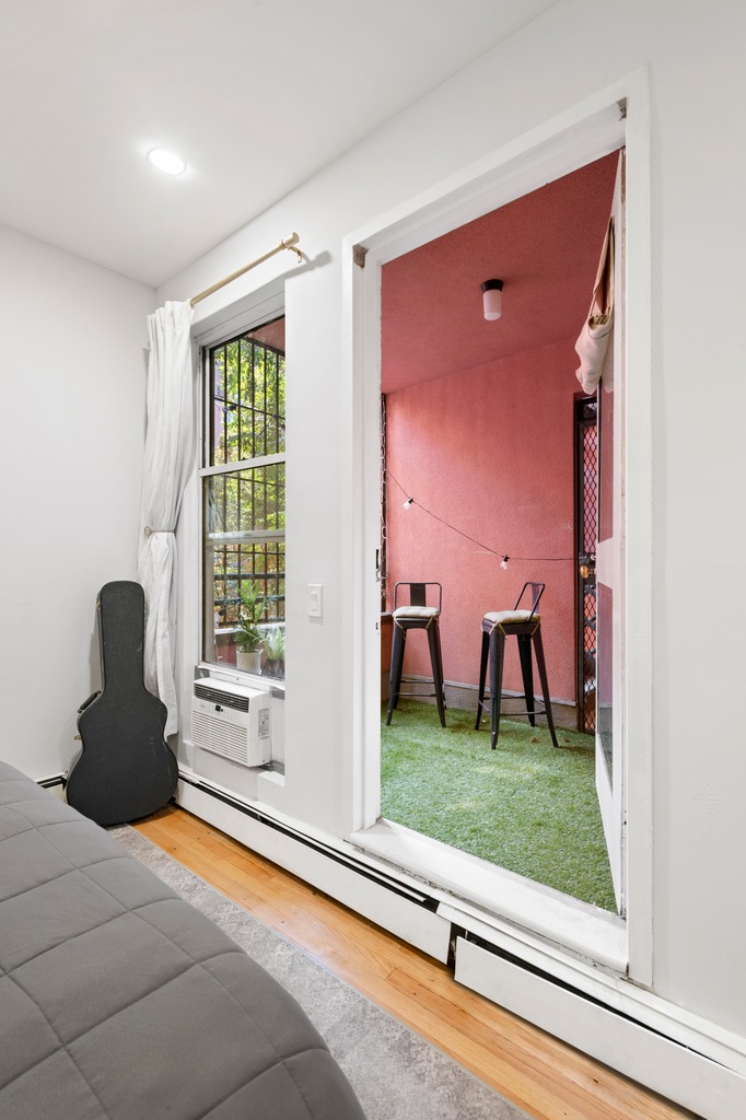 120 Manhattan Avenue, Unit 2A Manhattan, NY 10025 - Photo 5 of 10 a living room with furniture