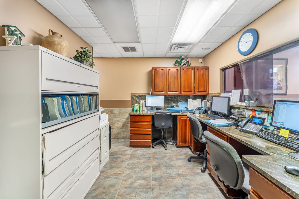 869 Bergen Avenue, Unit COMMERCIAL Jersey City, NJ 07306 - Photo 6 of 26 a kitchen with stainless steel appliances granite countertop a stove and cabinets