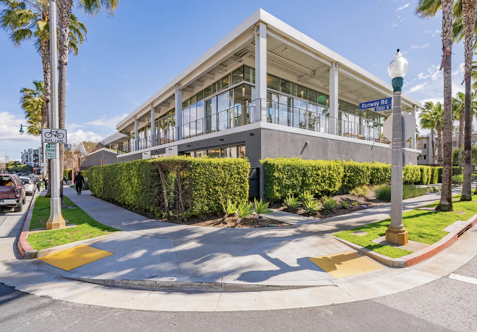 12963 West Runway Road Playa Vista, CA 90094 - Photo 26 of 39 a view of a swimming pool with potted plants and palm trees