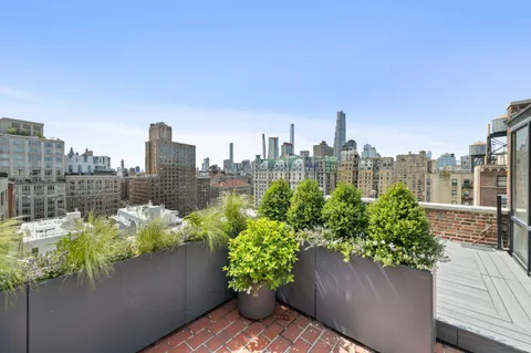 a view of a city with tall buildings