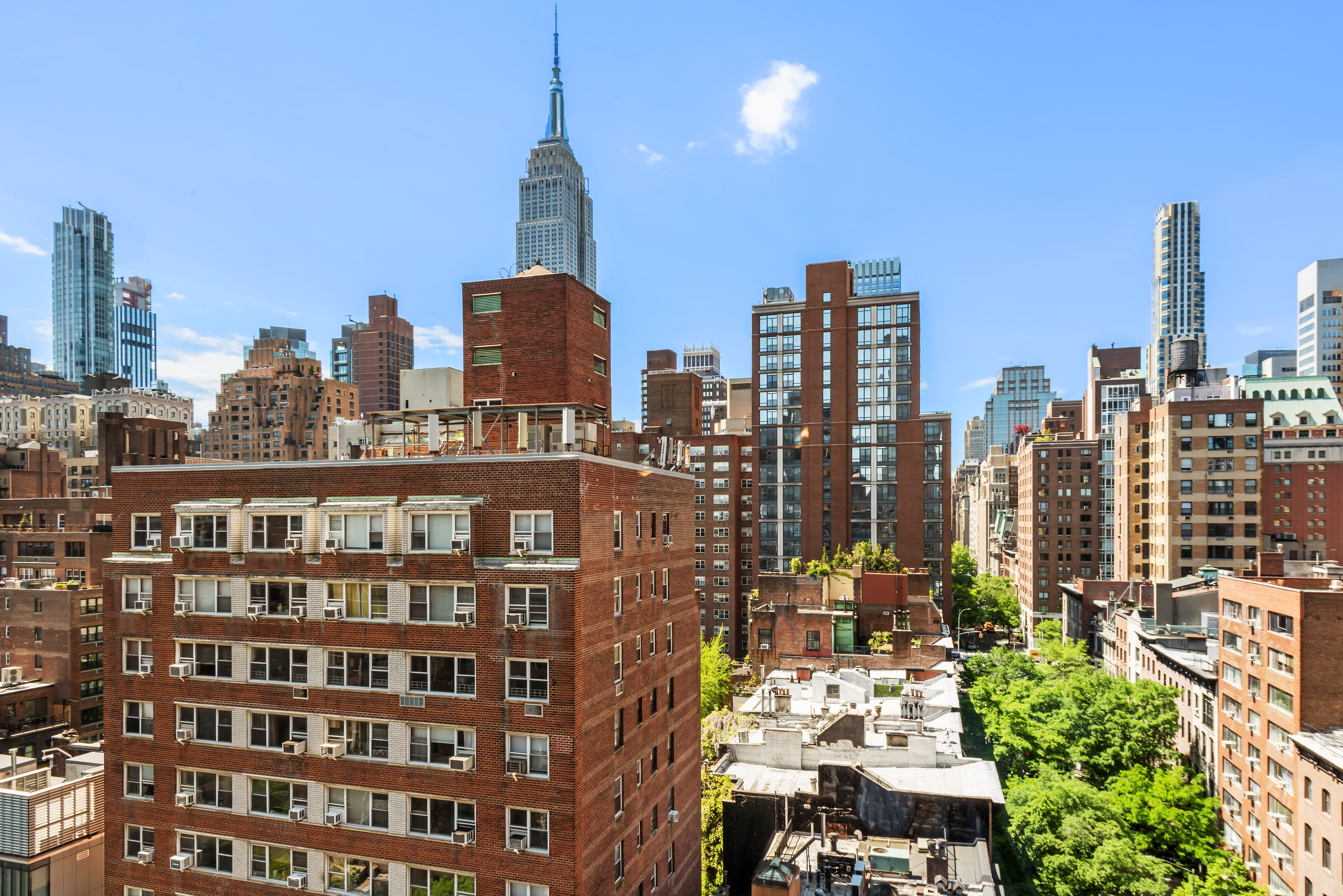 137 East 36th Street, Unit 12G Manhattan, NY 10016 - Photo 3 of 15 a view of a city with tall buildings