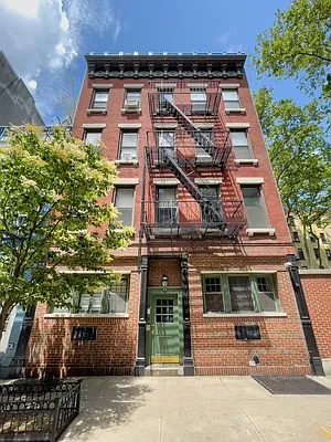 13 Downing Street, Unit 9 Manhattan, NY 10014 - Photo 7 of 8 front view of a building