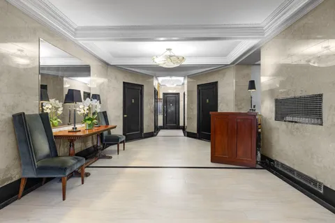 a room with furniture and window