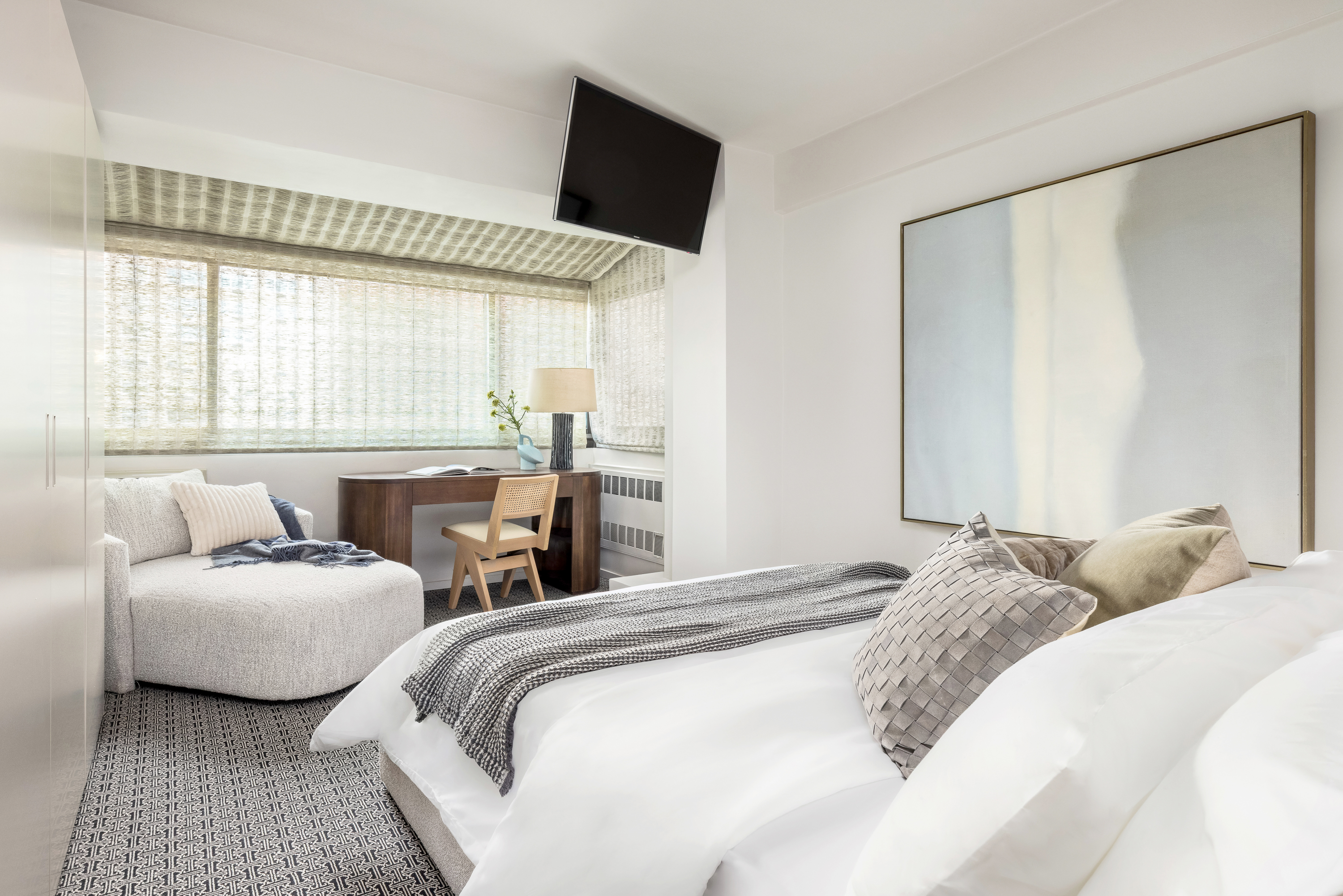 510 East 86th Street, Unit 17C Manhattan, NY 10028 - Photo 23 of 31 a bedroom with two beds and a large window