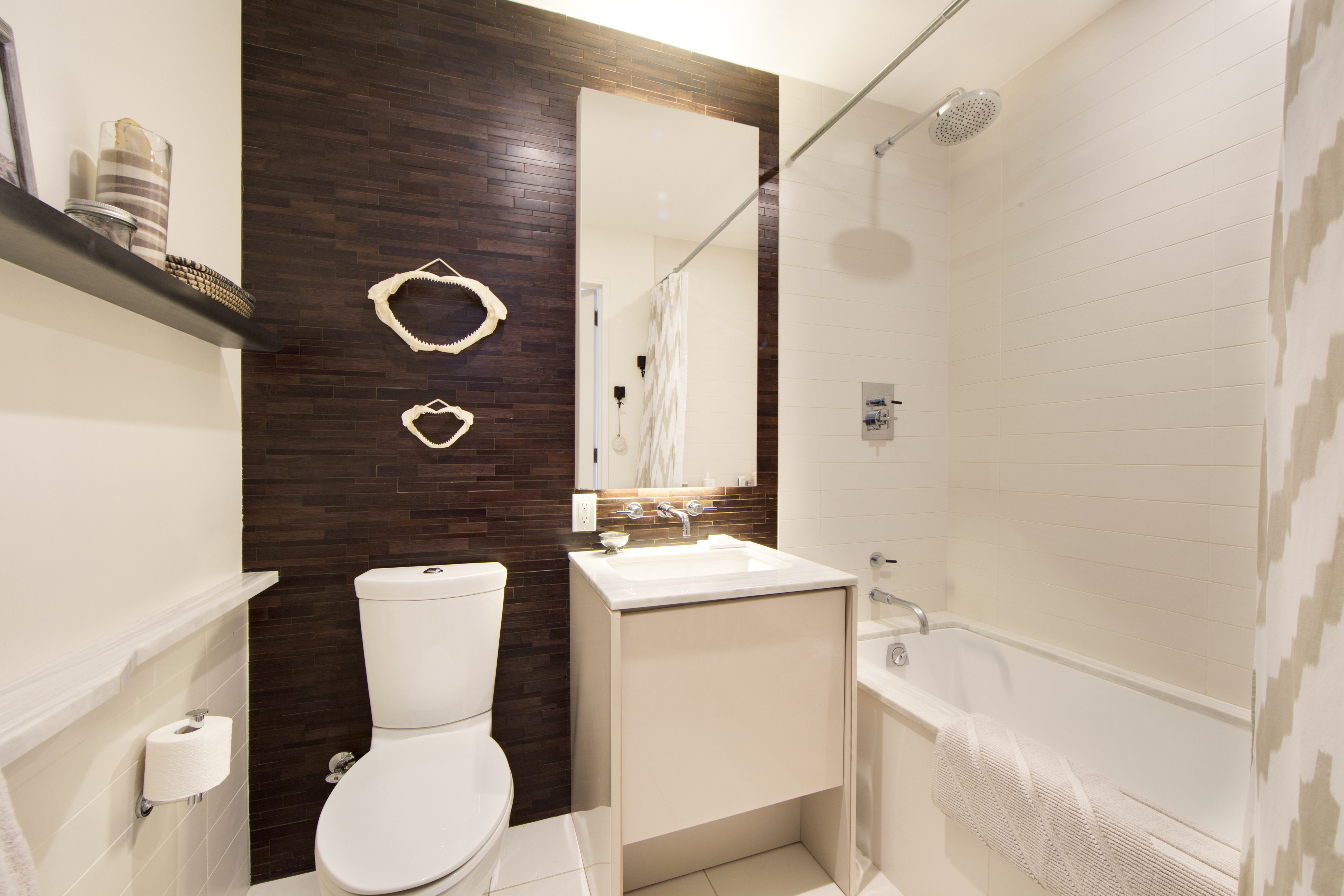 2 Northside Piers, Unit 4B Brooklyn, NY 11249 - Photo 10 of 18 a bathroom with a toilet sink and mirror