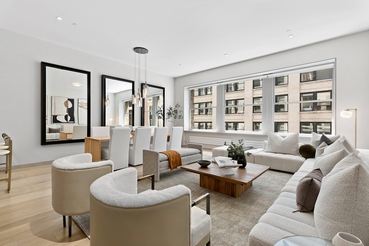 29 West 21st Street, Unit PH Manhattan, NY 10010 - Photo 4 of 17 a living room with furniture and a large window